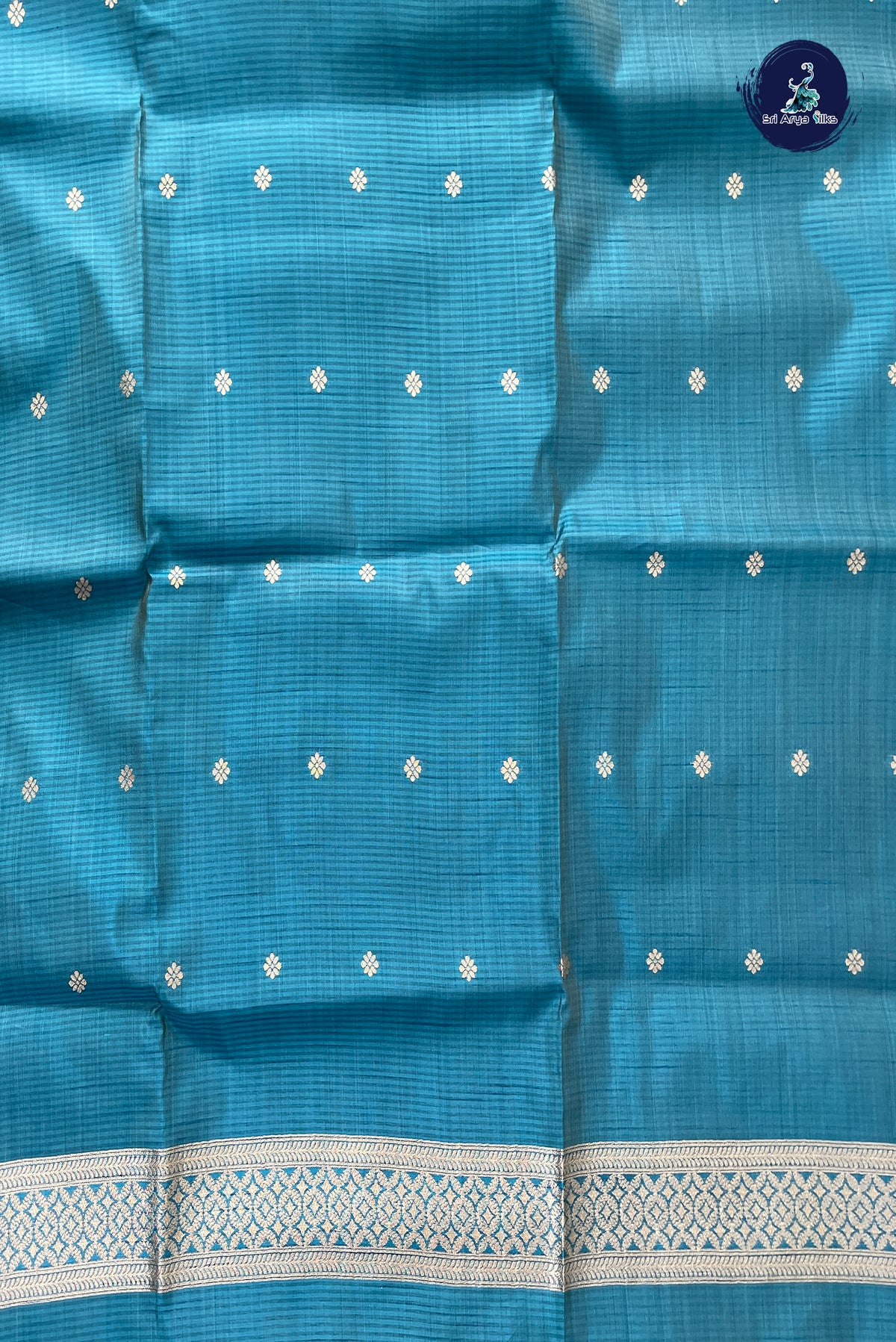 Teal Blue Semi Tussar Saree With Zari Buttas Pattern