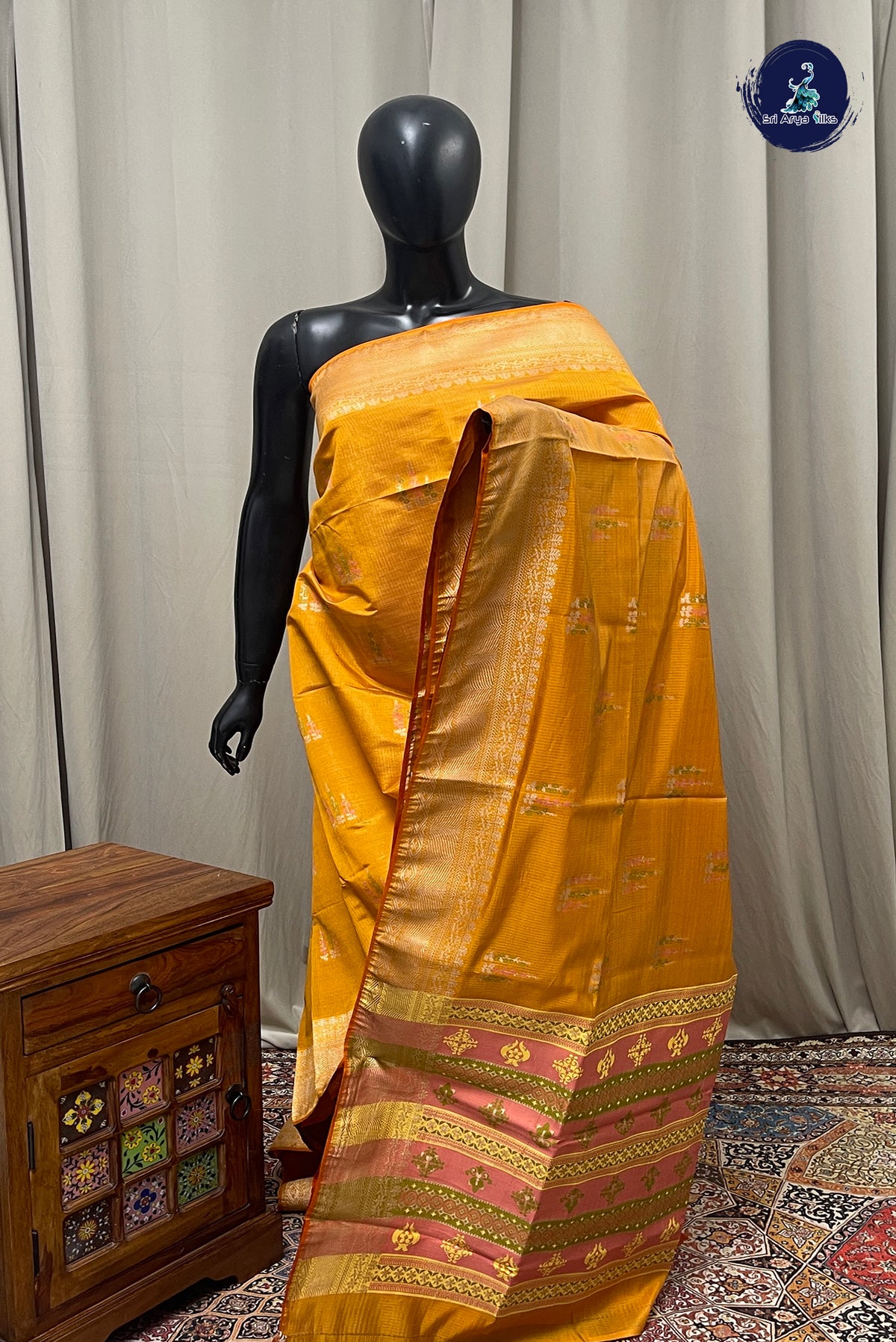 Lite Mustard Orange Semi Tussar Saree With Zari Buttas Pattern