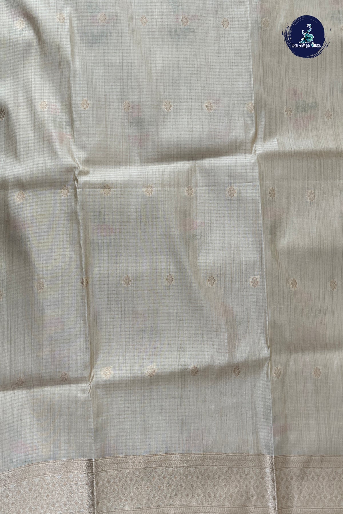 Off White Semi Tussar Saree With Zari Buttas Pattern