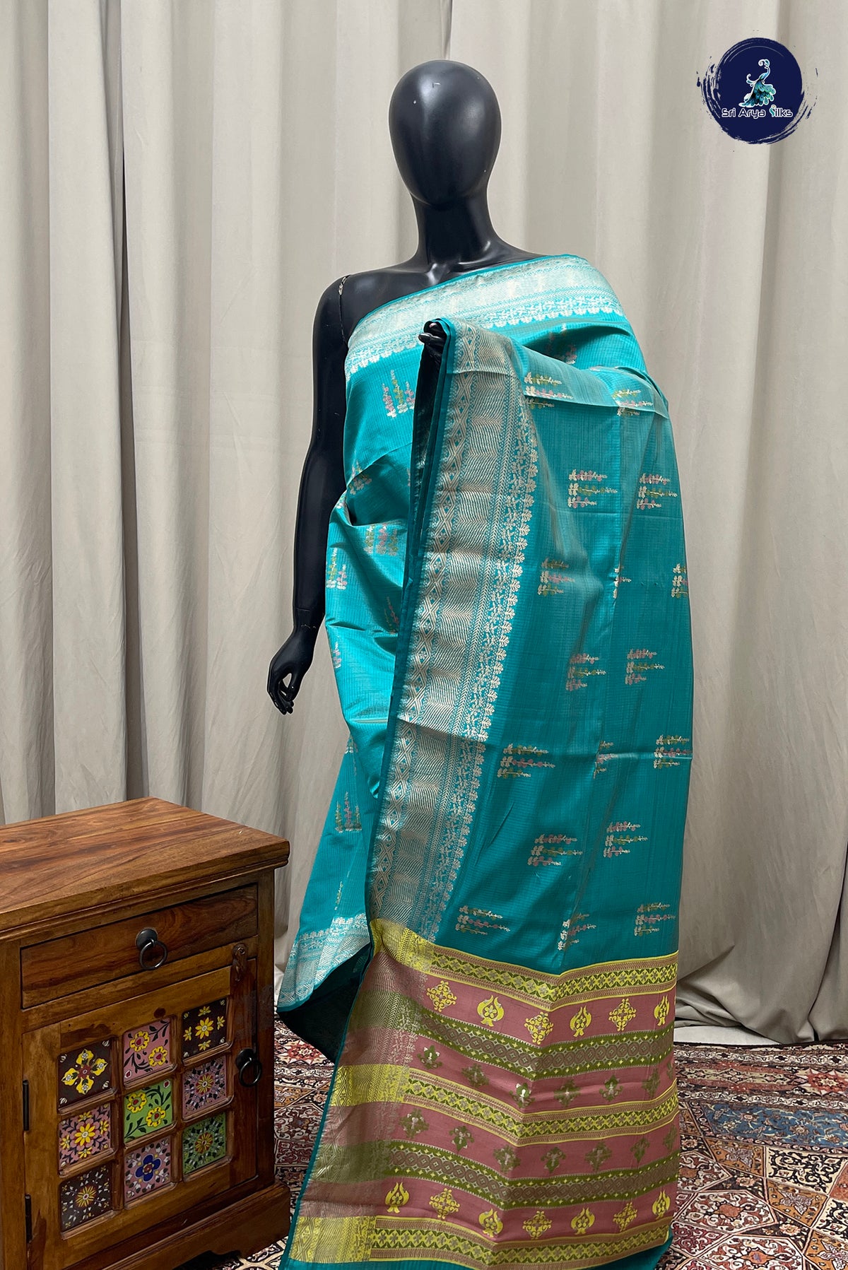 Turquoise Semi Tussar Saree With Zari Buttas Pattern