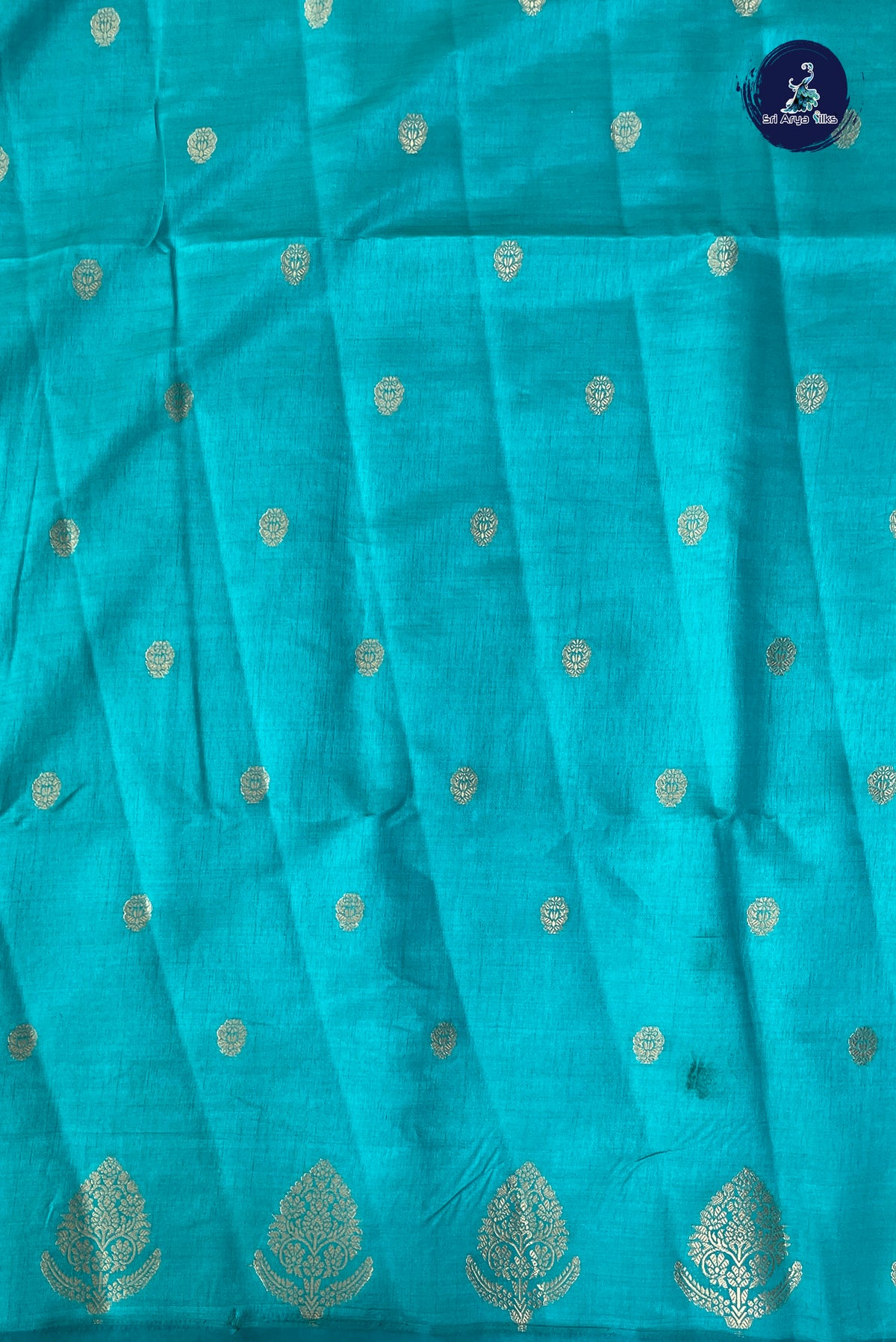 Turquoise Semi Tussar Saree With Zari Buttas Pattern