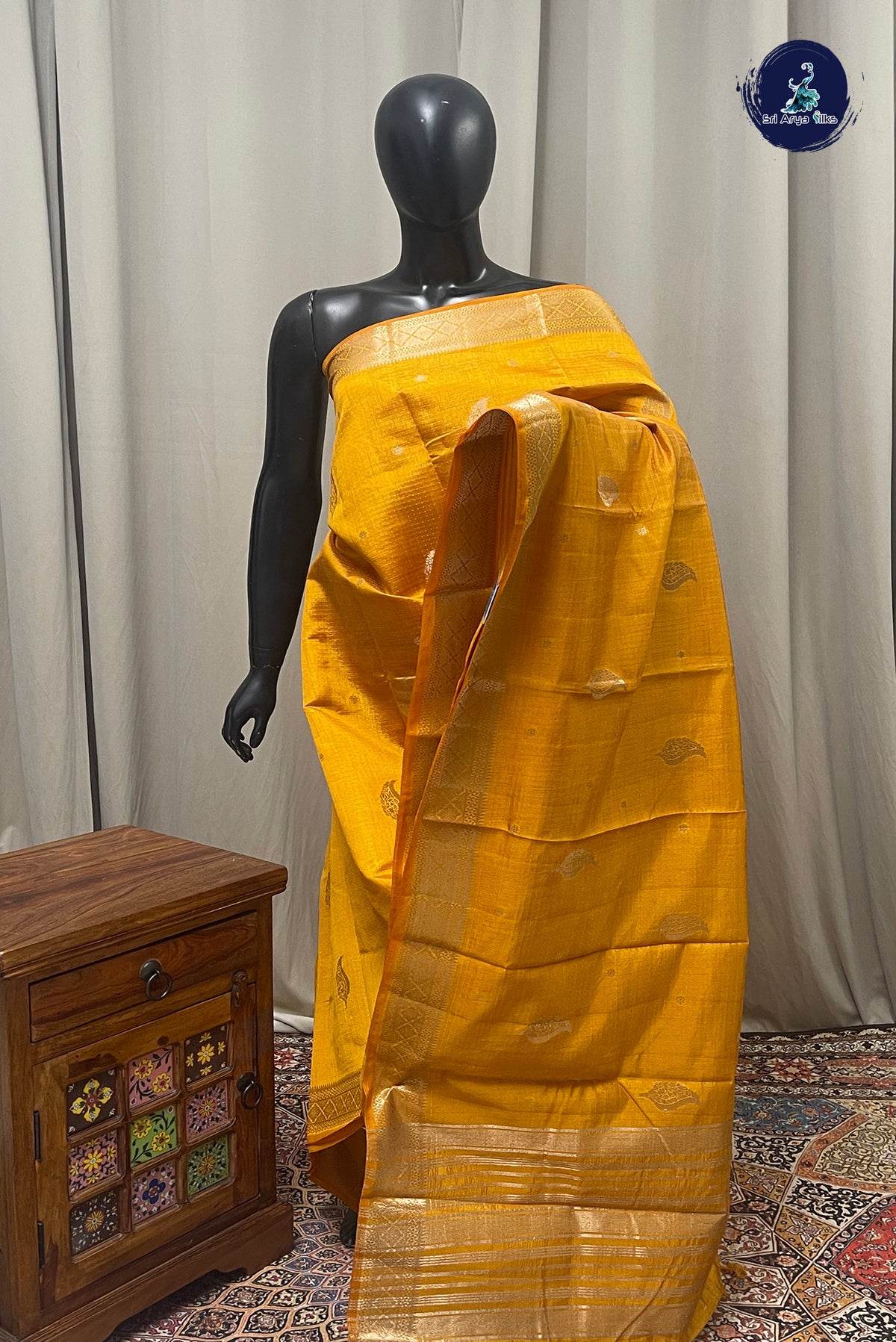 Lite Mustard Orange Semi Tussar Saree With Zari Buttas Pattern