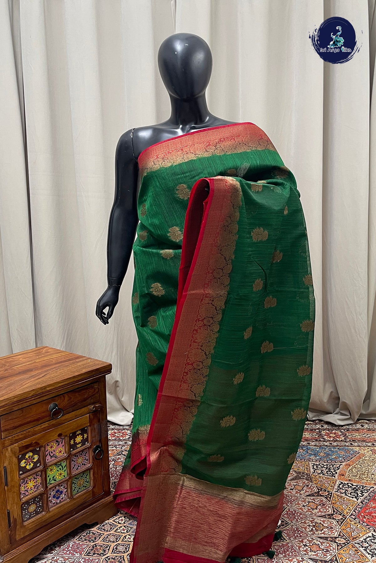 Bottle Green Raw Silk Saree With Zari Buttas Pattern