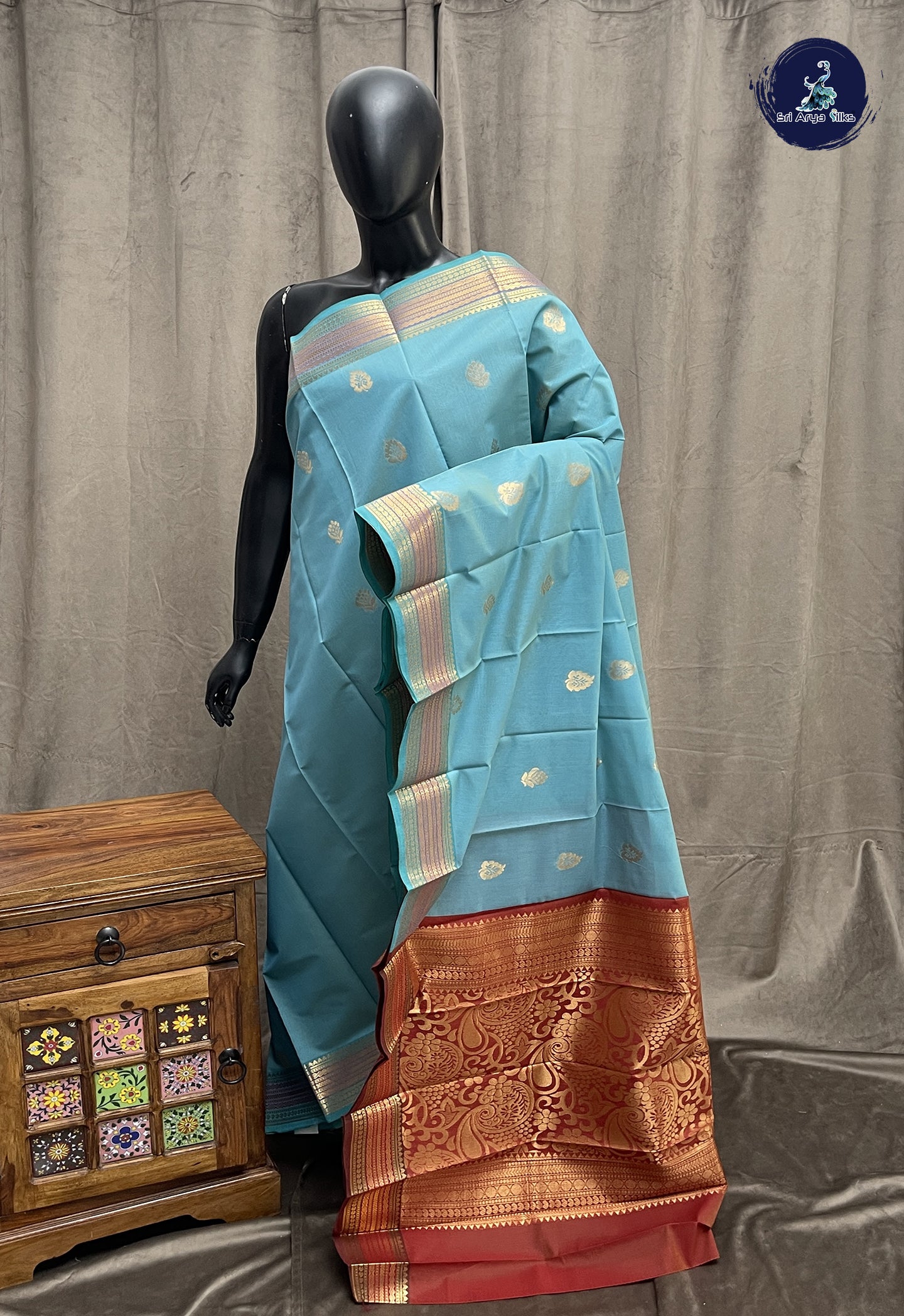 Greyish Blue Semi Silk Cotton Saree With Zari Buttas Pattern