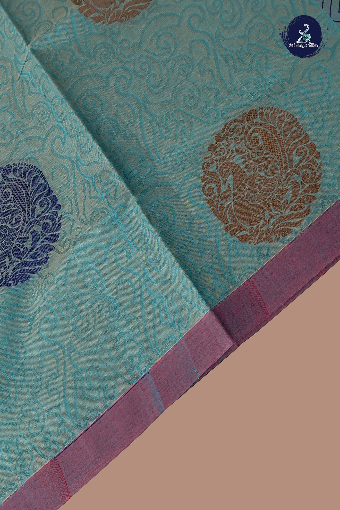 Blue Cotton Saree With Embossed Pattern