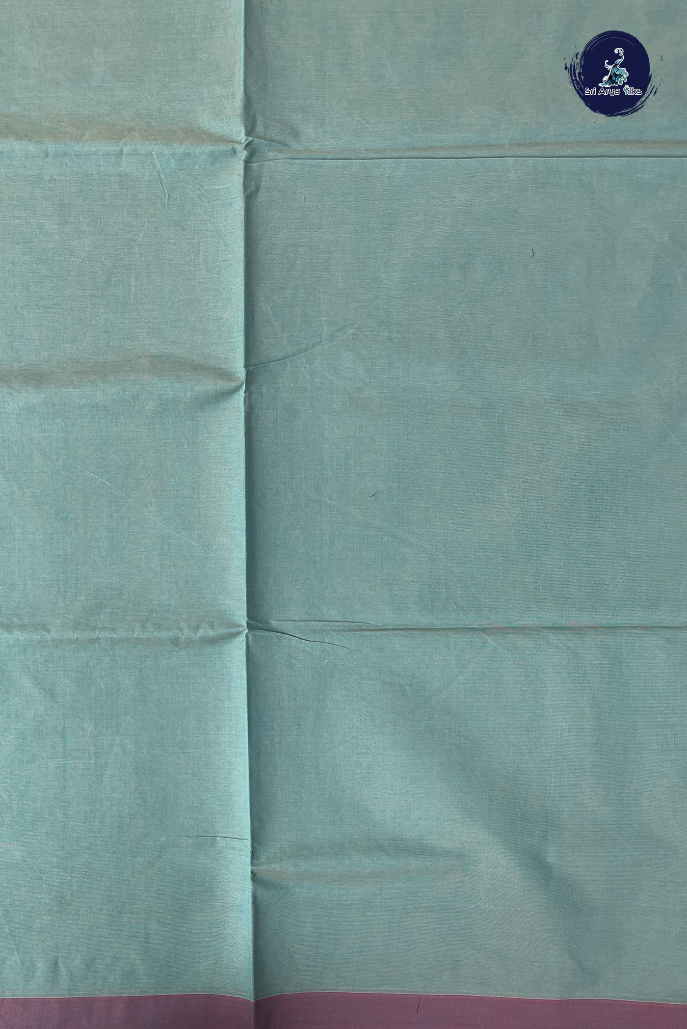 Blue Cotton Saree With Embossed Pattern