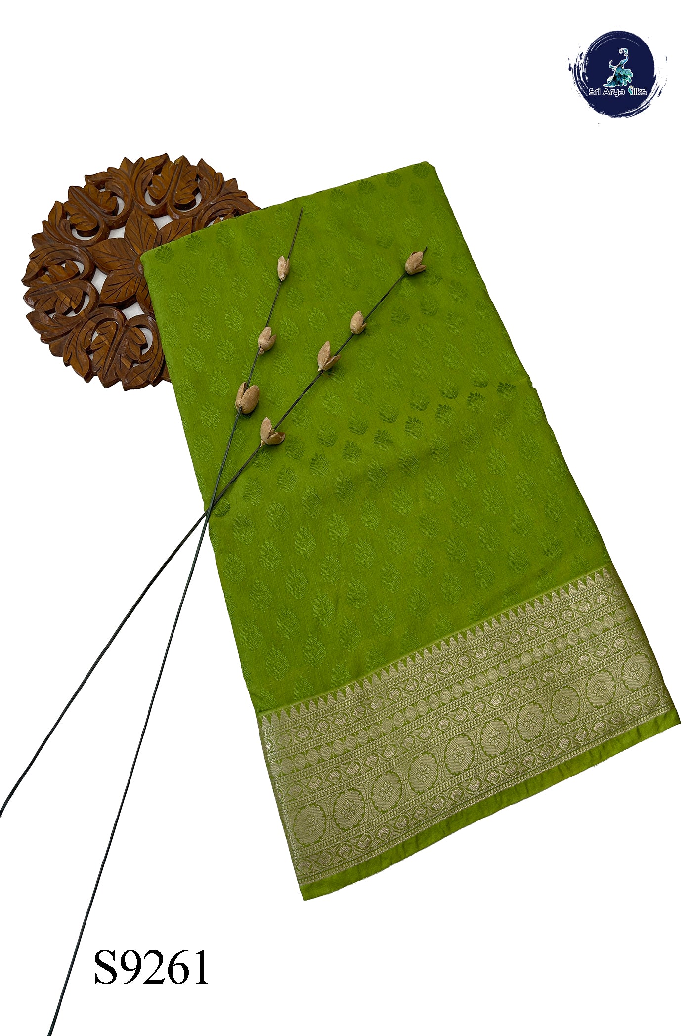 Light Green Semi Raw Silk Saree With Embossed Pattern