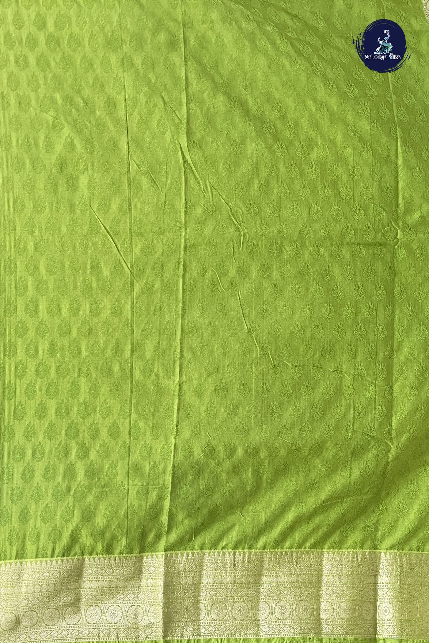 Light Green Semi Raw Silk Saree With Embossed Pattern