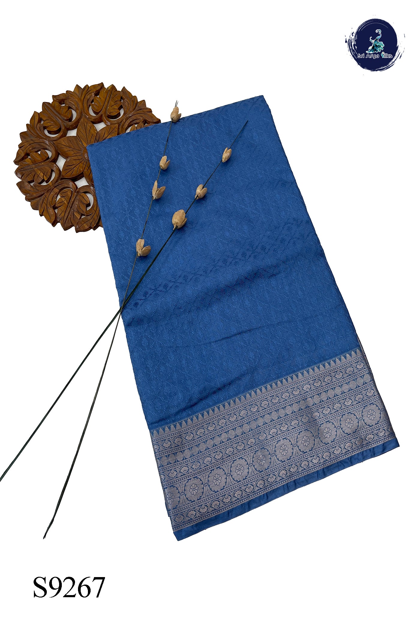 Blue Semi Raw Silk Saree With Embossed Pattern