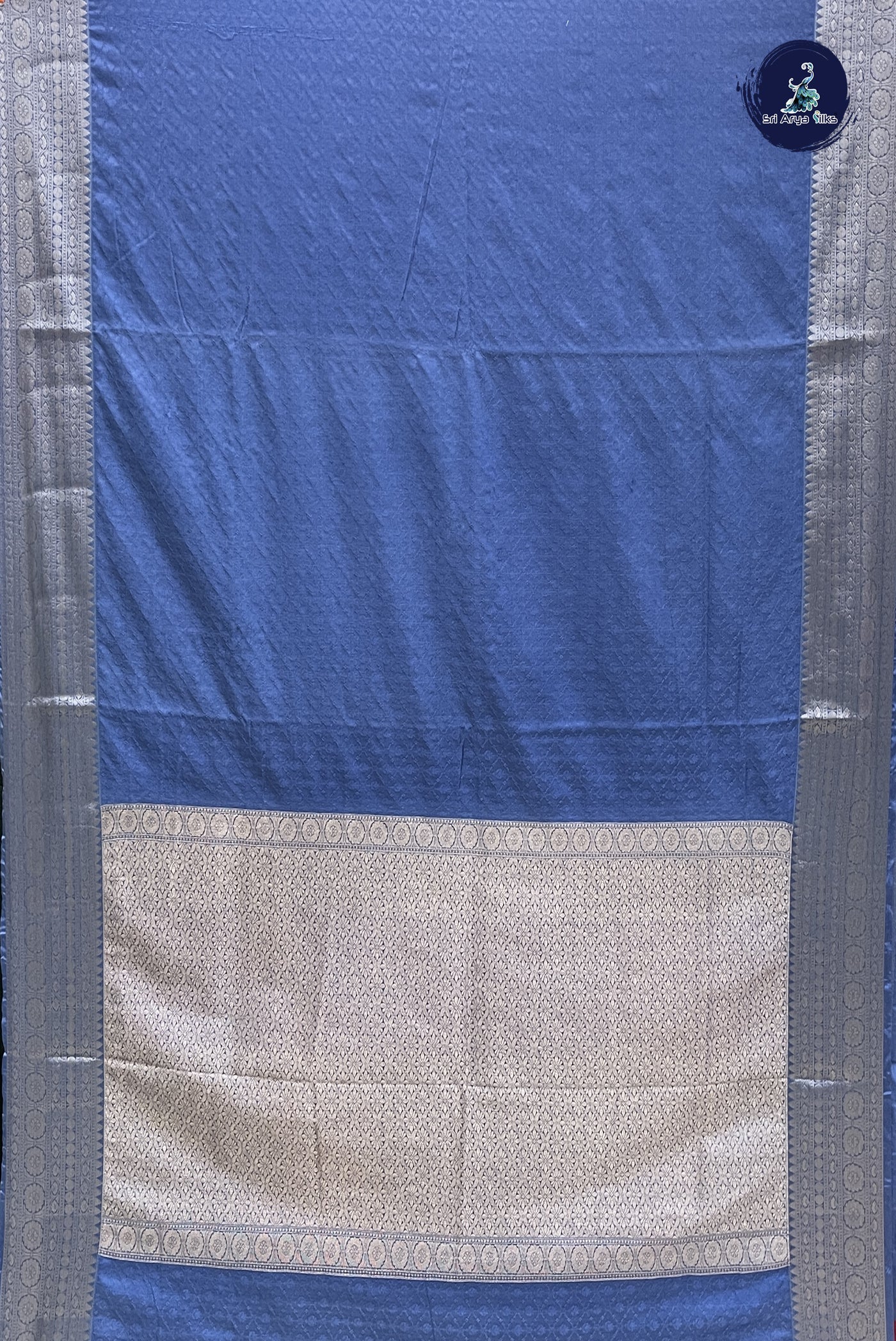Blue Semi Raw Silk Saree With Embossed Pattern