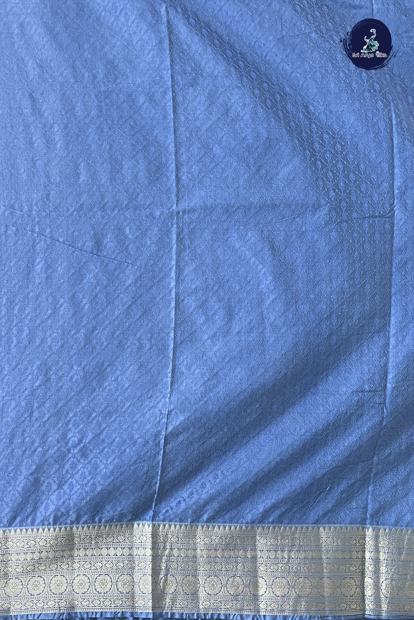 Blue Semi Raw Silk Saree With Embossed Pattern