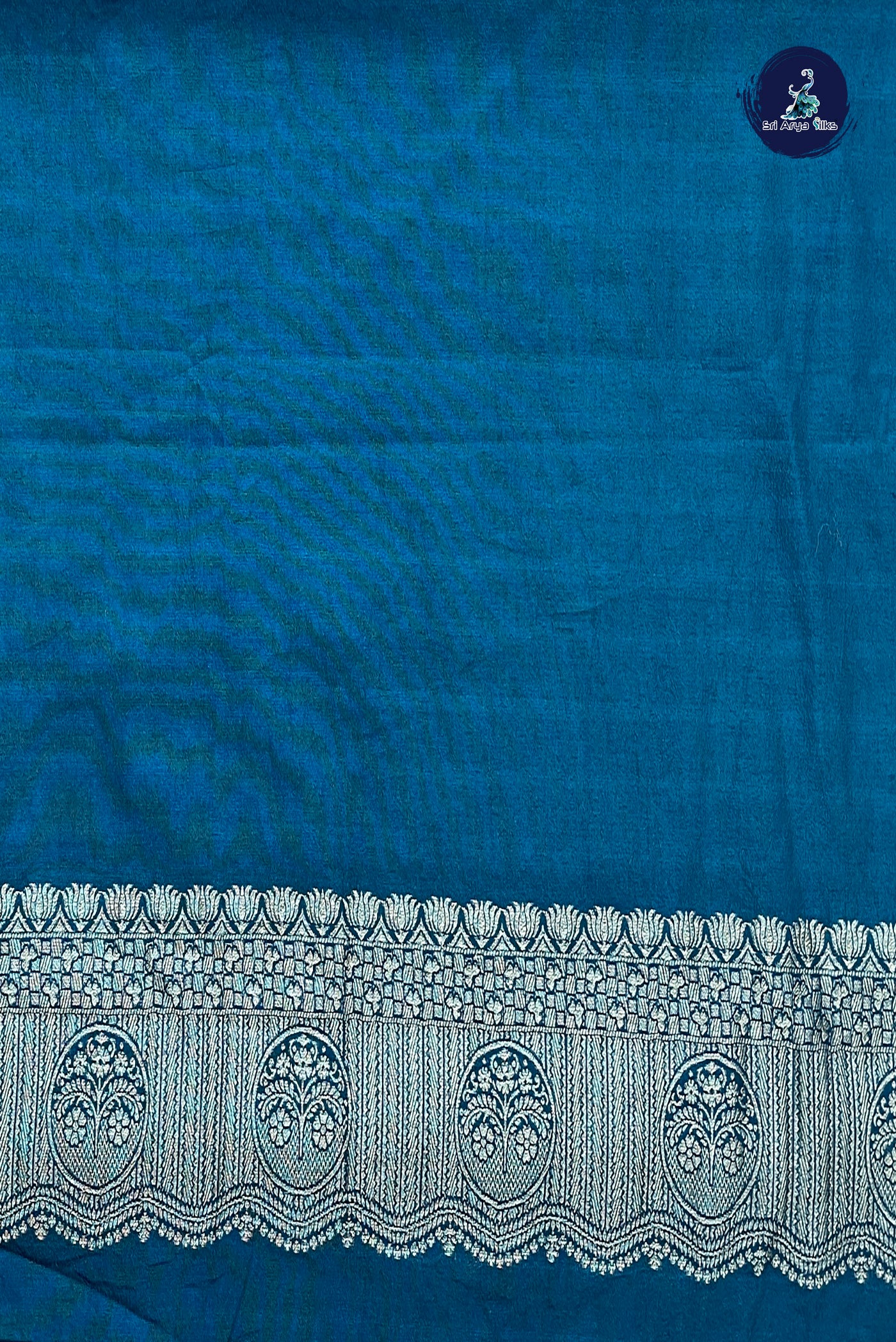 Sapphire Blue Georgette Banarasi Saree With Zari Buttas Pattern