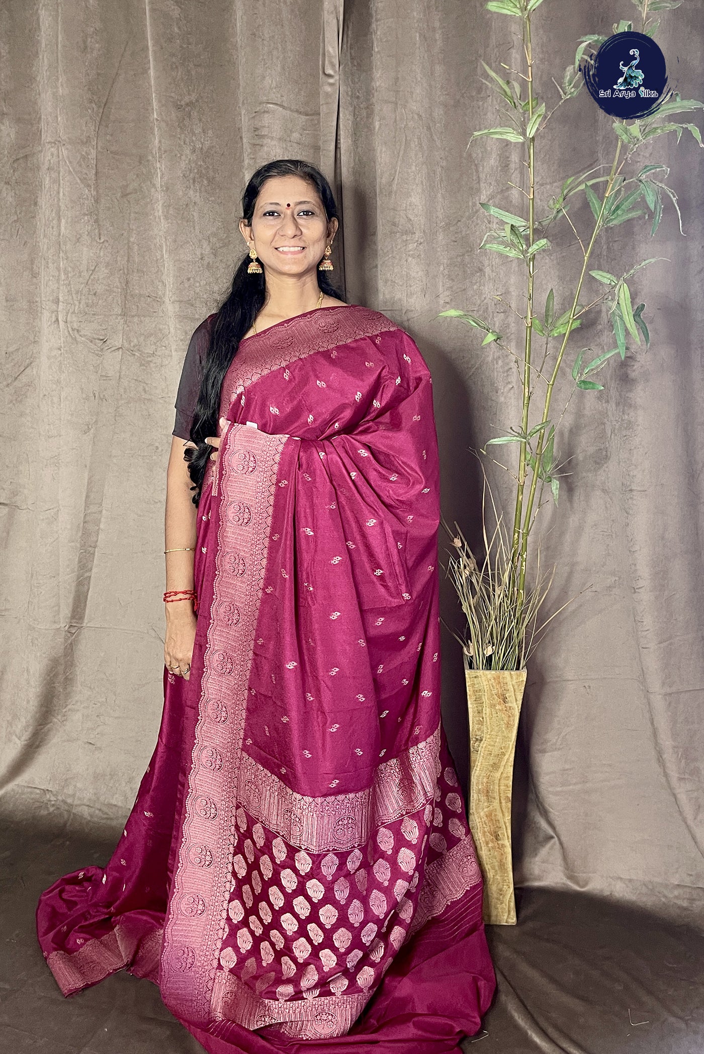 Dark Pink Georgette Banarasi Saree With Zari Buttas Pattern
