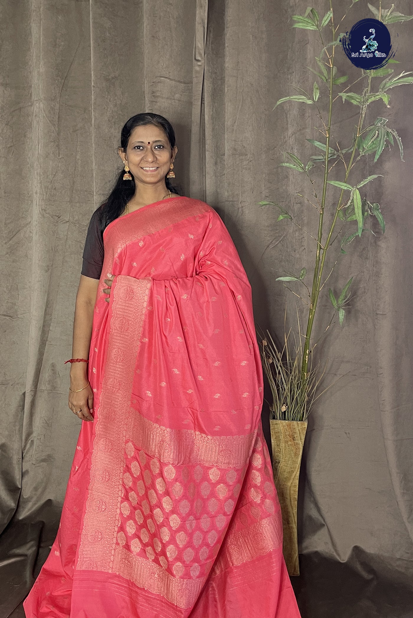 Pinkish Orange Georgette Banarasi Saree With Zari Buttas Pattern