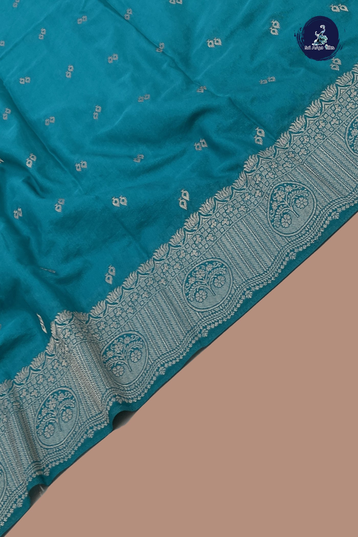 Teal Blue Georgette Banarasi Saree With Zari Buttas Pattern