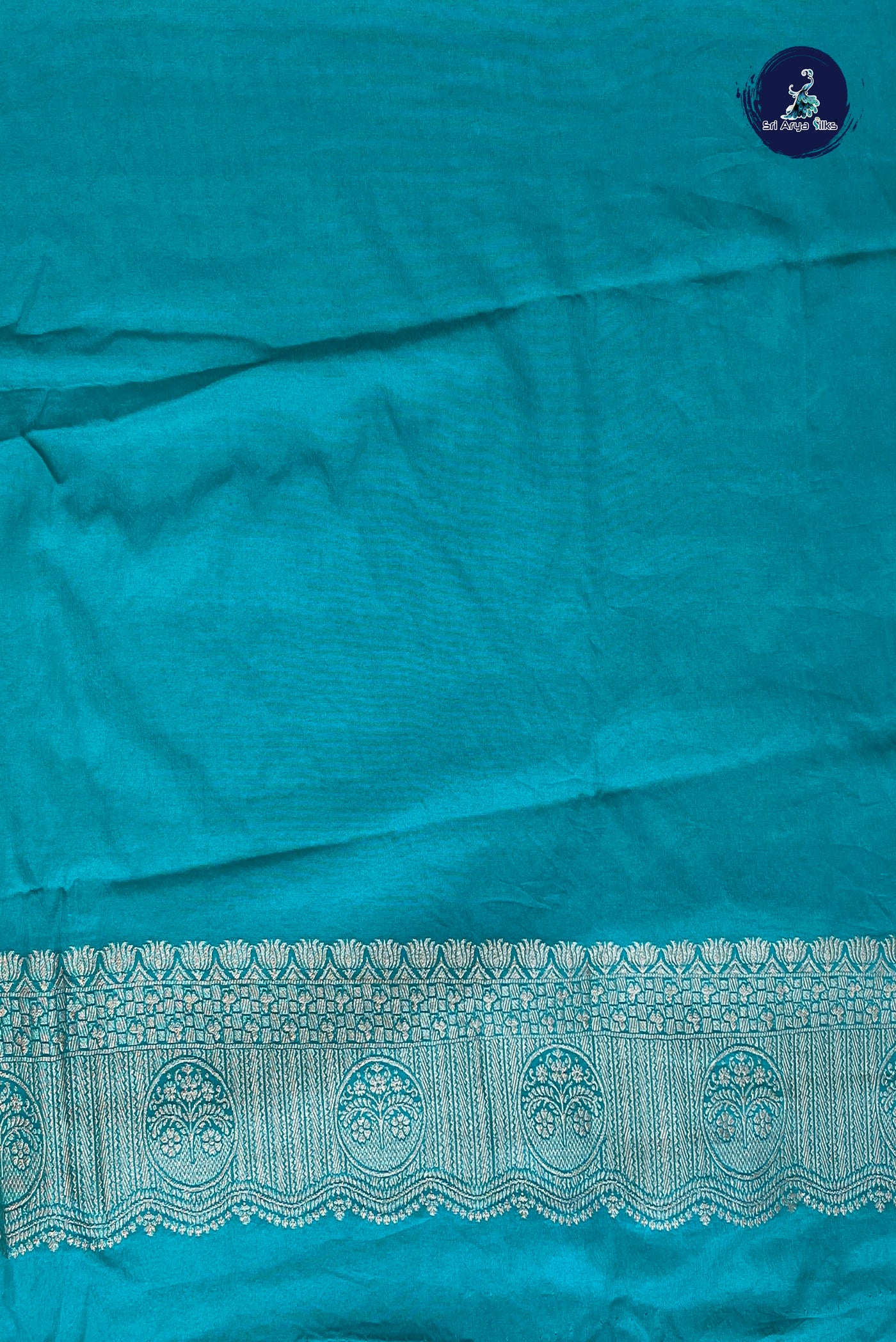 Teal Blue Georgette Banarasi Saree With Zari Buttas Pattern