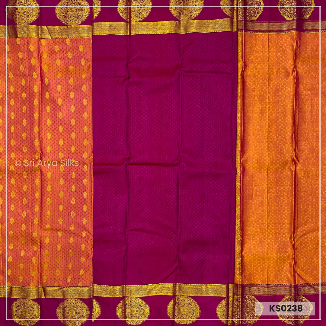 Dual Tone Orange Brocade Silk Saree With Magenta Pink Blouse & Embossed Pattern