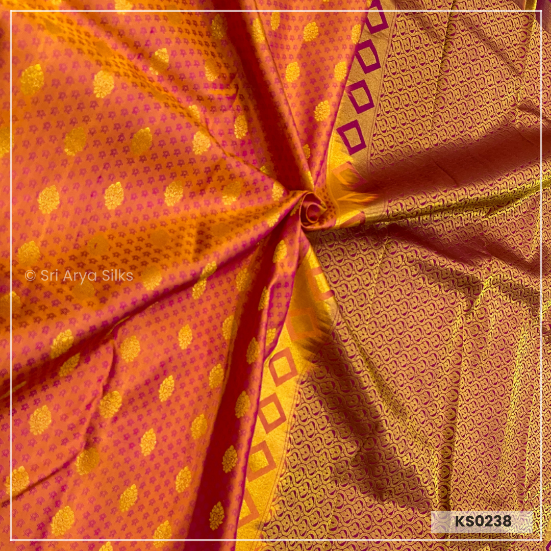 Dual Tone Orange Brocade Silk Saree With Magenta Pink Blouse & Embossed Pattern