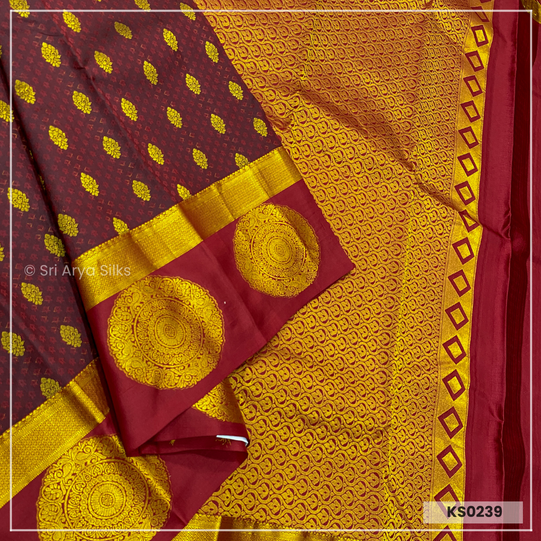Coke Maroon Brocade Silk Saree With Maroon Blouse & Embossed Pattern
