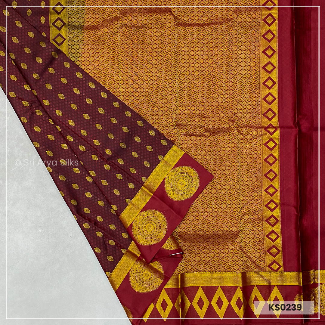 Coke Maroon Brocade Silk Saree With Maroon Blouse & Embossed Pattern