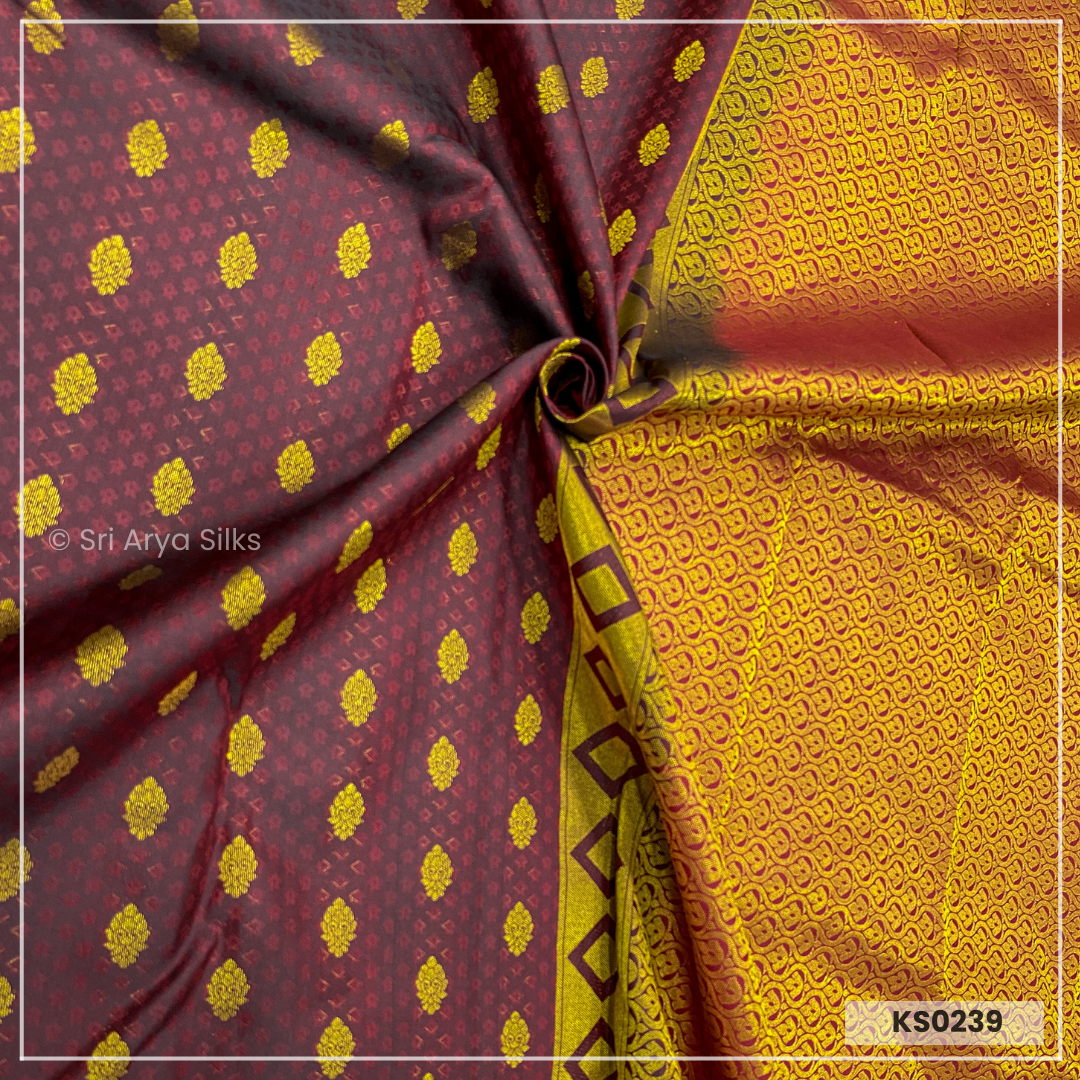 Coke Maroon Brocade Silk Saree With Maroon Blouse & Embossed Pattern