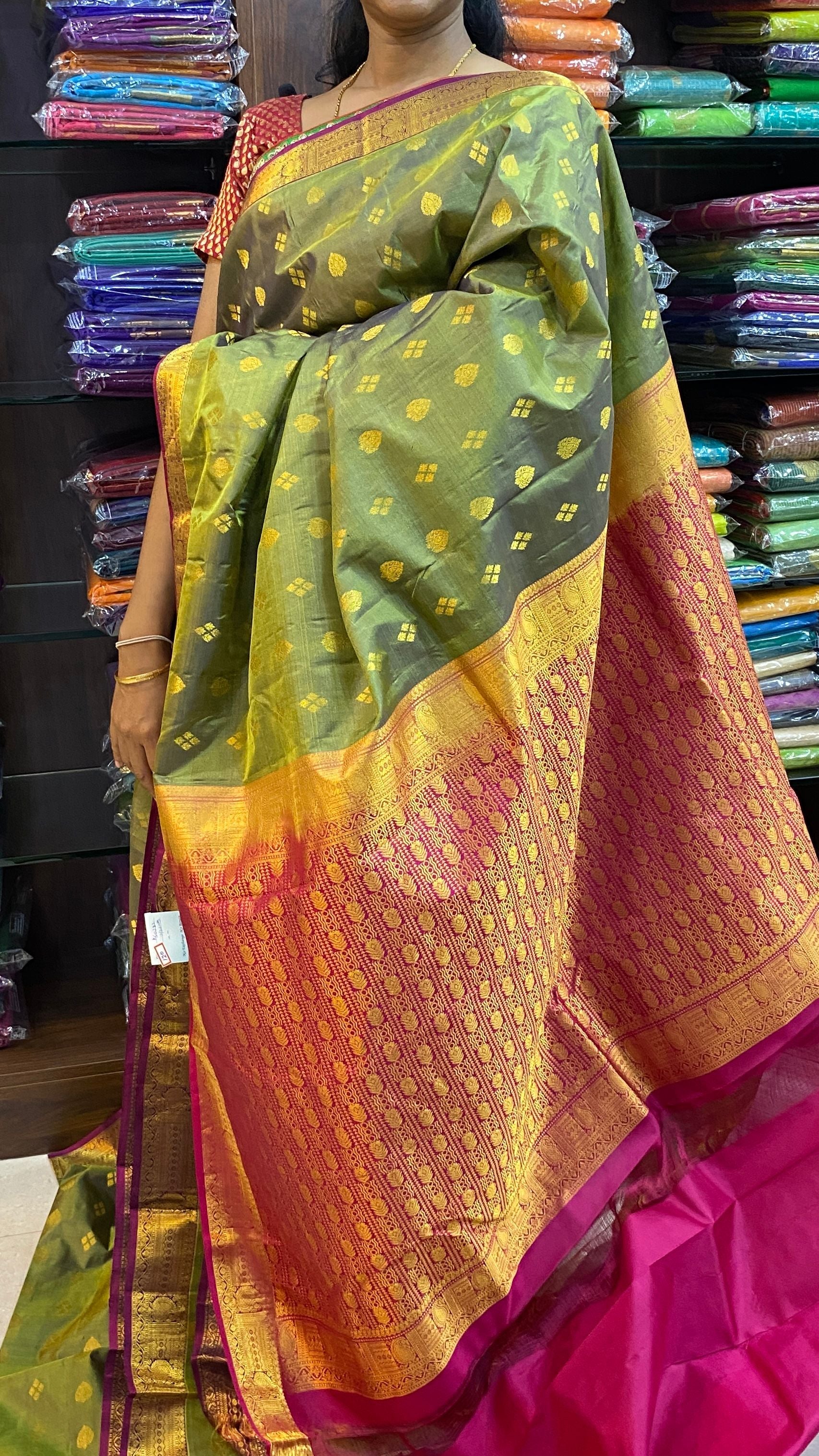 Light Military Green Traditional Silk Saree With Magenta Pink Blouse & Body Butta Pattern