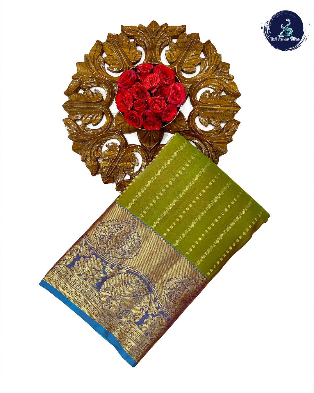 Mehendi Green Traditional Silk Saree With Copper Sulphate Blue Blouse & Buttas Pattern