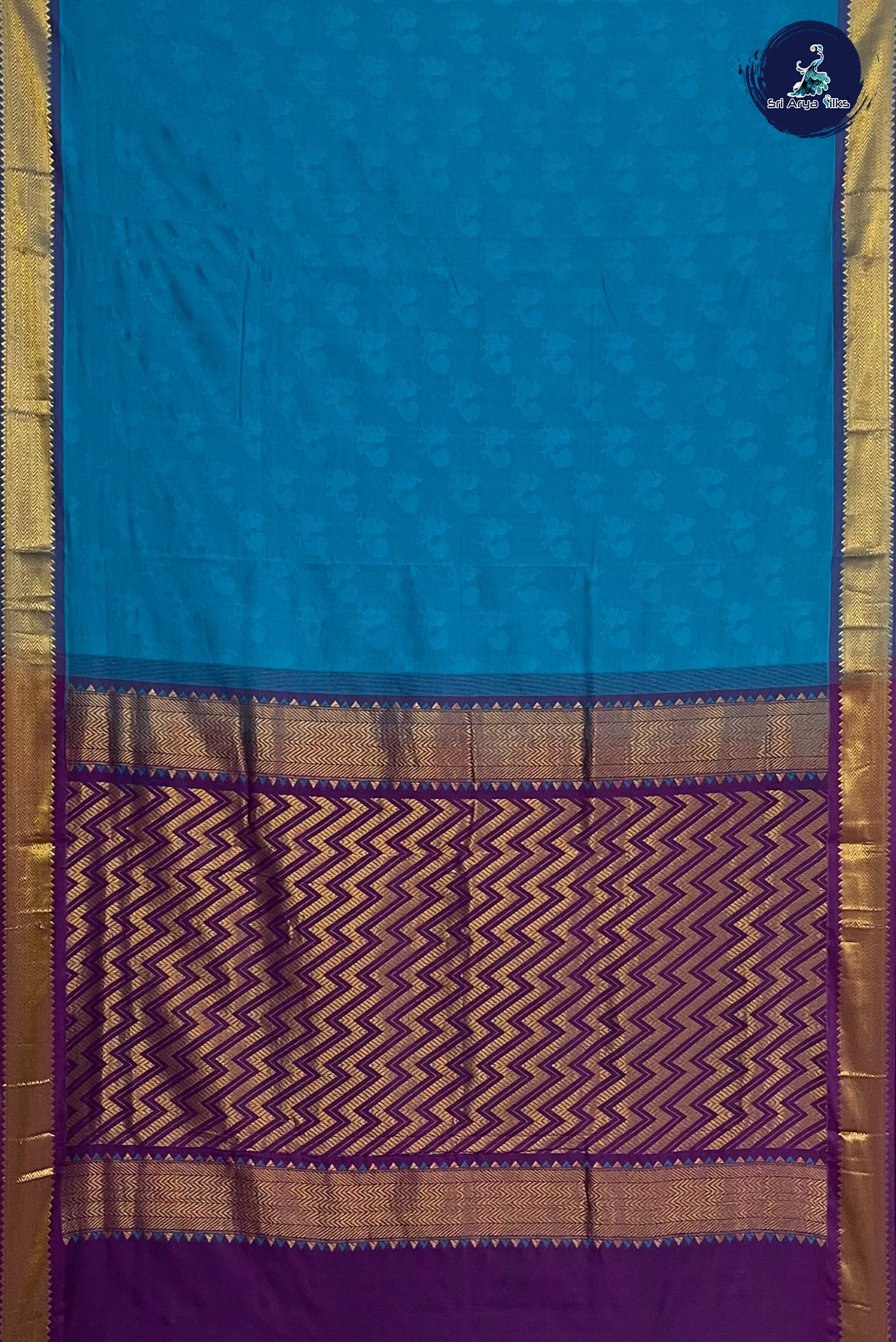 Light Blue Madisar Semi Silk Cotton Saree With Embossed Pattern