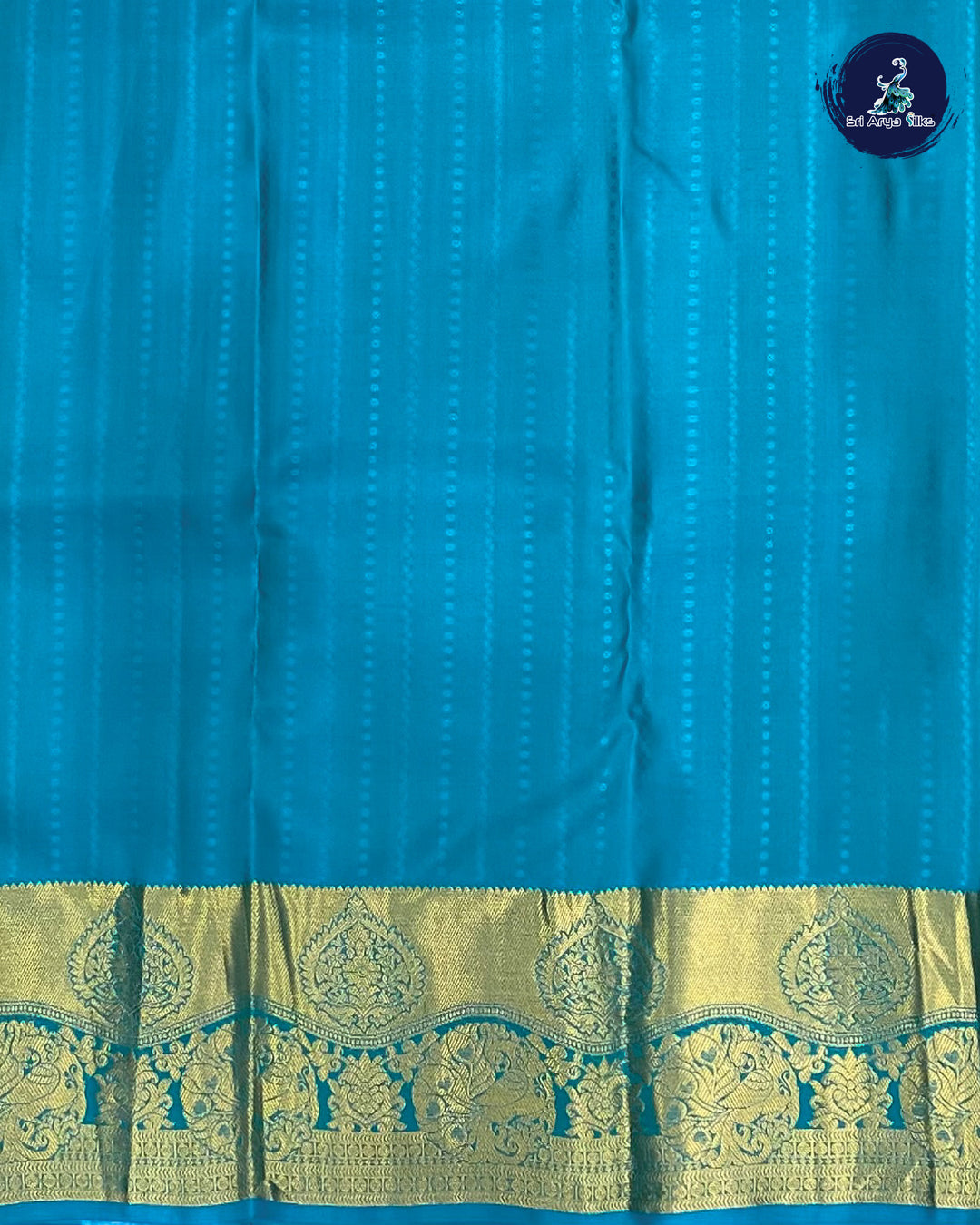 Mehendi Green Traditional Silk Saree With Copper Sulphate Blue Blouse & Buttas Pattern