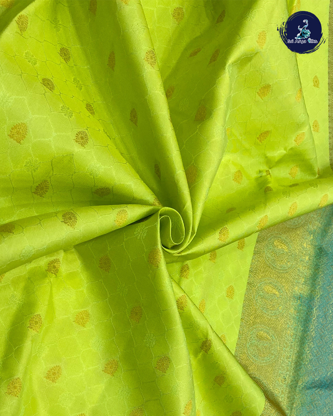 Light Green Korvai Contrast Silk Saree With Teal Blouse & Buttas Pattern