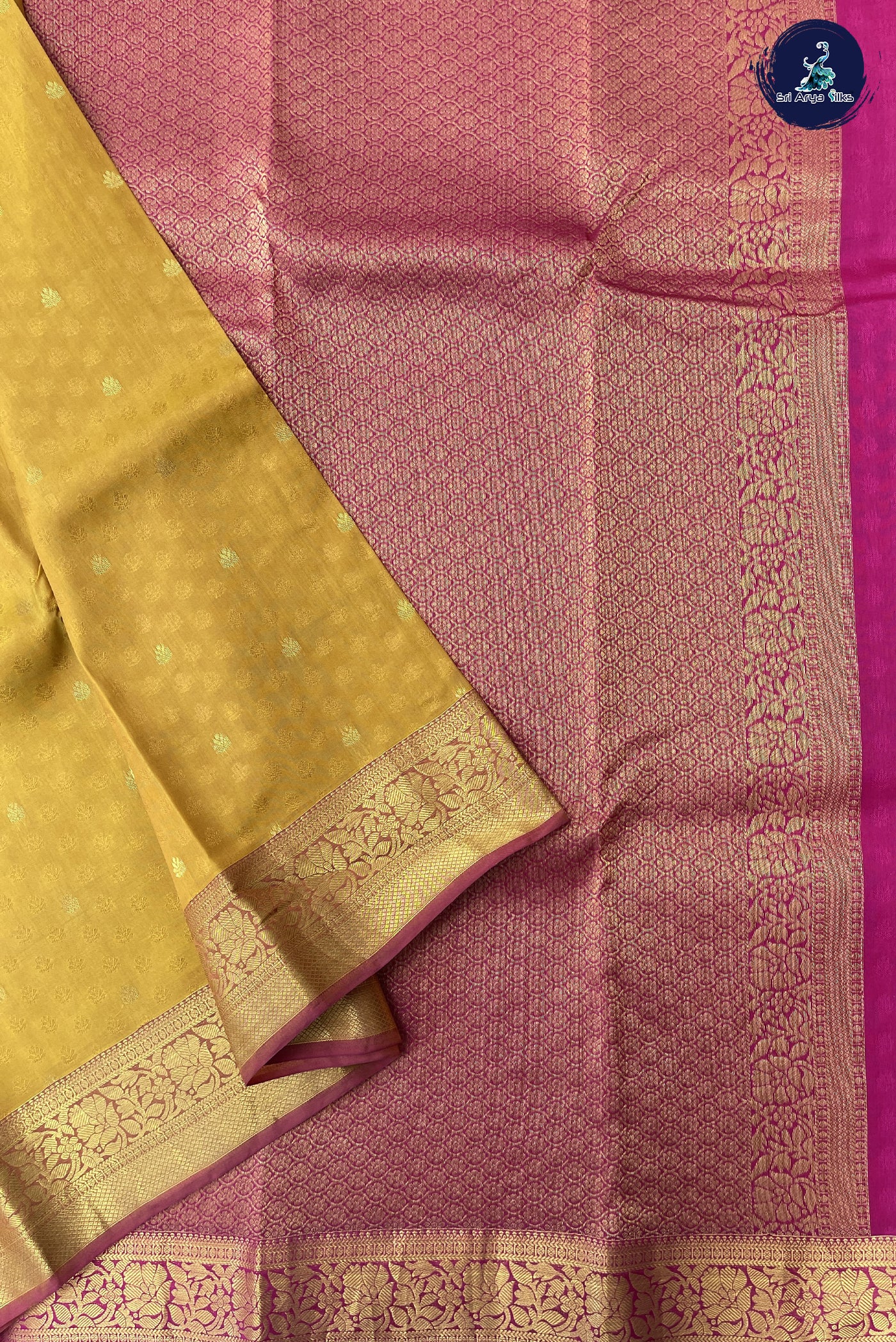 Mustard Yellow Embosed Saree With Pink Blouse & Buttas Pattern