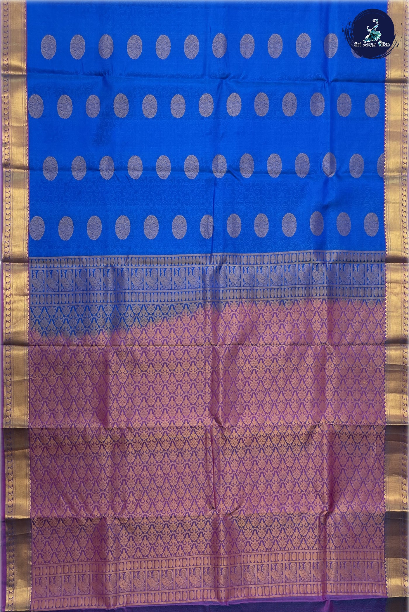 Blue Embosed Saree With Purple Blouse & Buttas Pattern