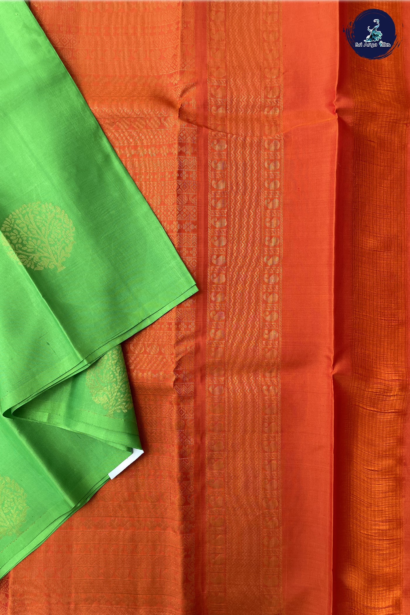 Green Light Weight Silk Saree With Zari Buttas Pattern