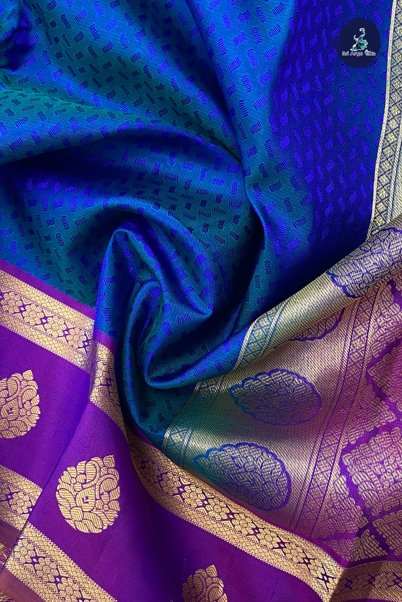 Dual Tone Blue Bridal Silk Saree With Embossed Pattern