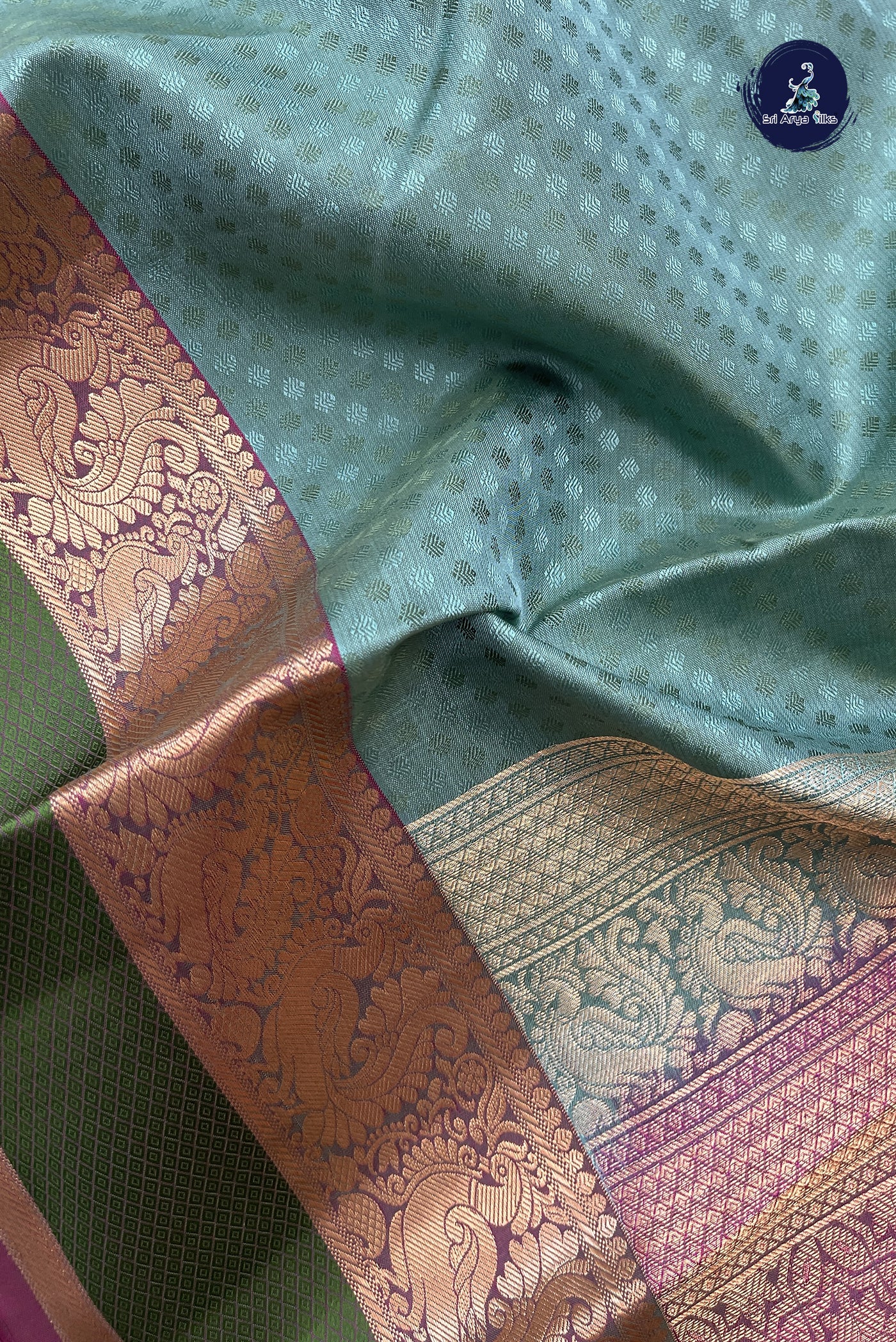 Greyish Green Silk Saree With Embossed Pattern