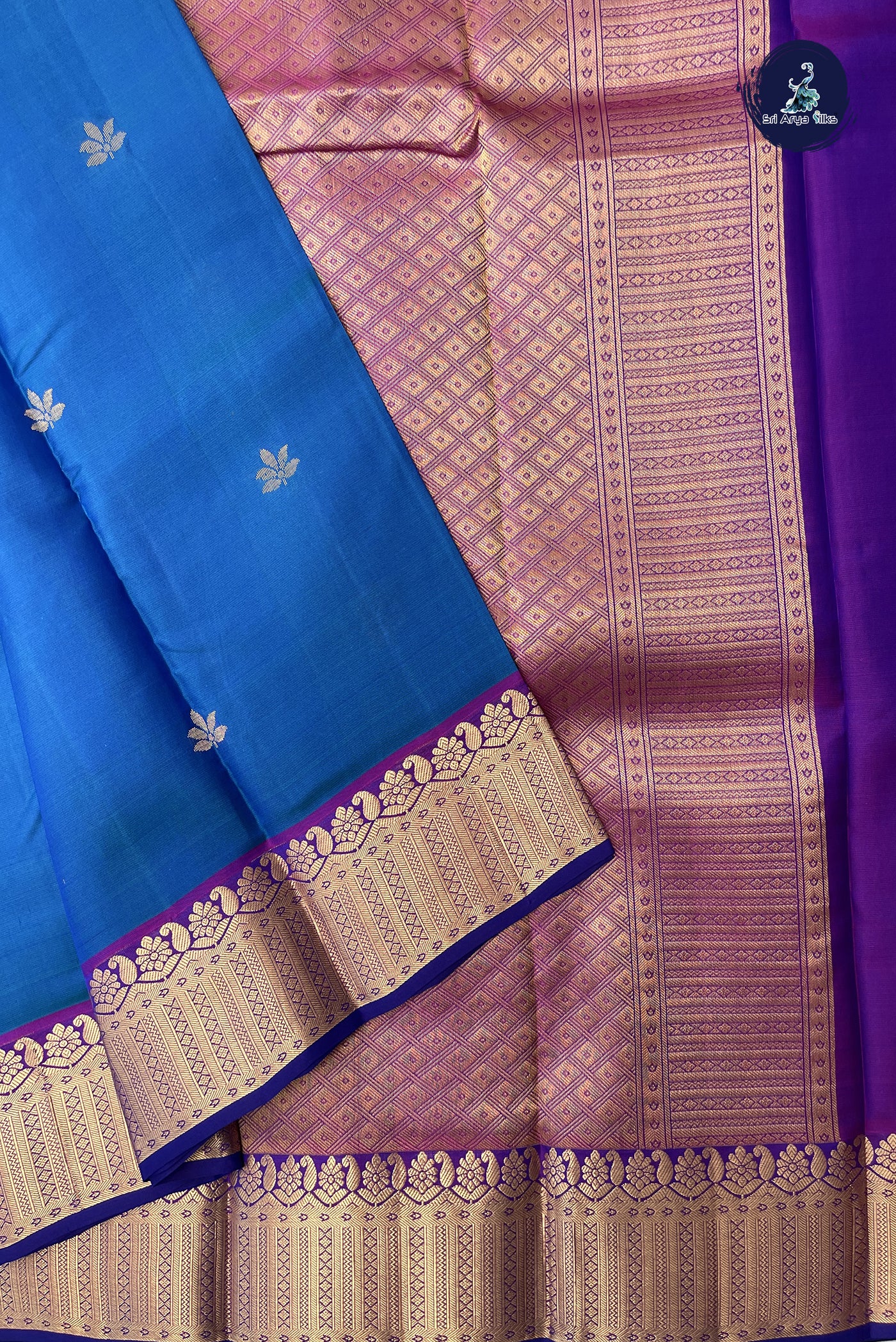 Peacock Blue Bridal Silk Saree With Zari Buttas Pattern