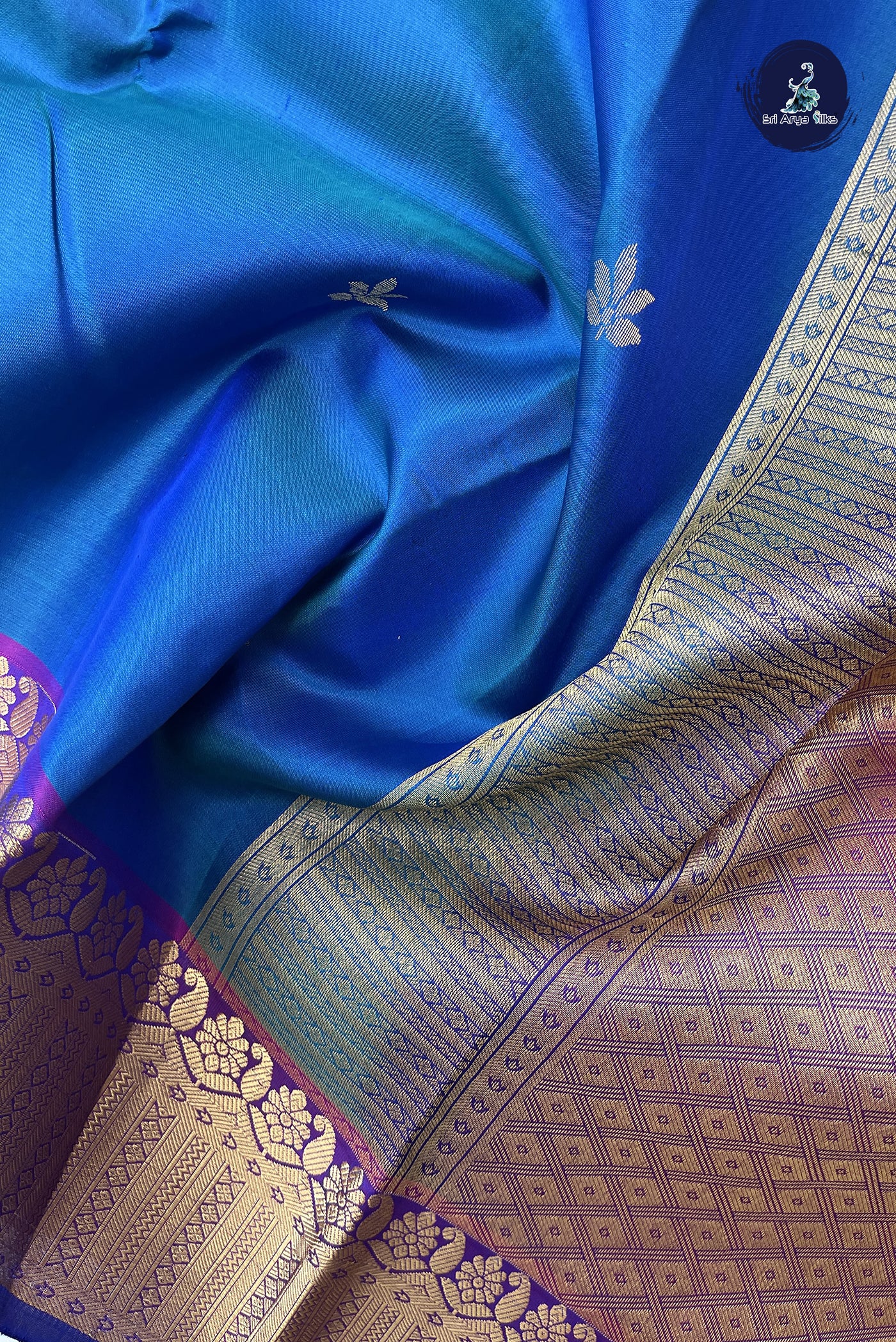 Peacock Blue Bridal Silk Saree With Zari Buttas Pattern