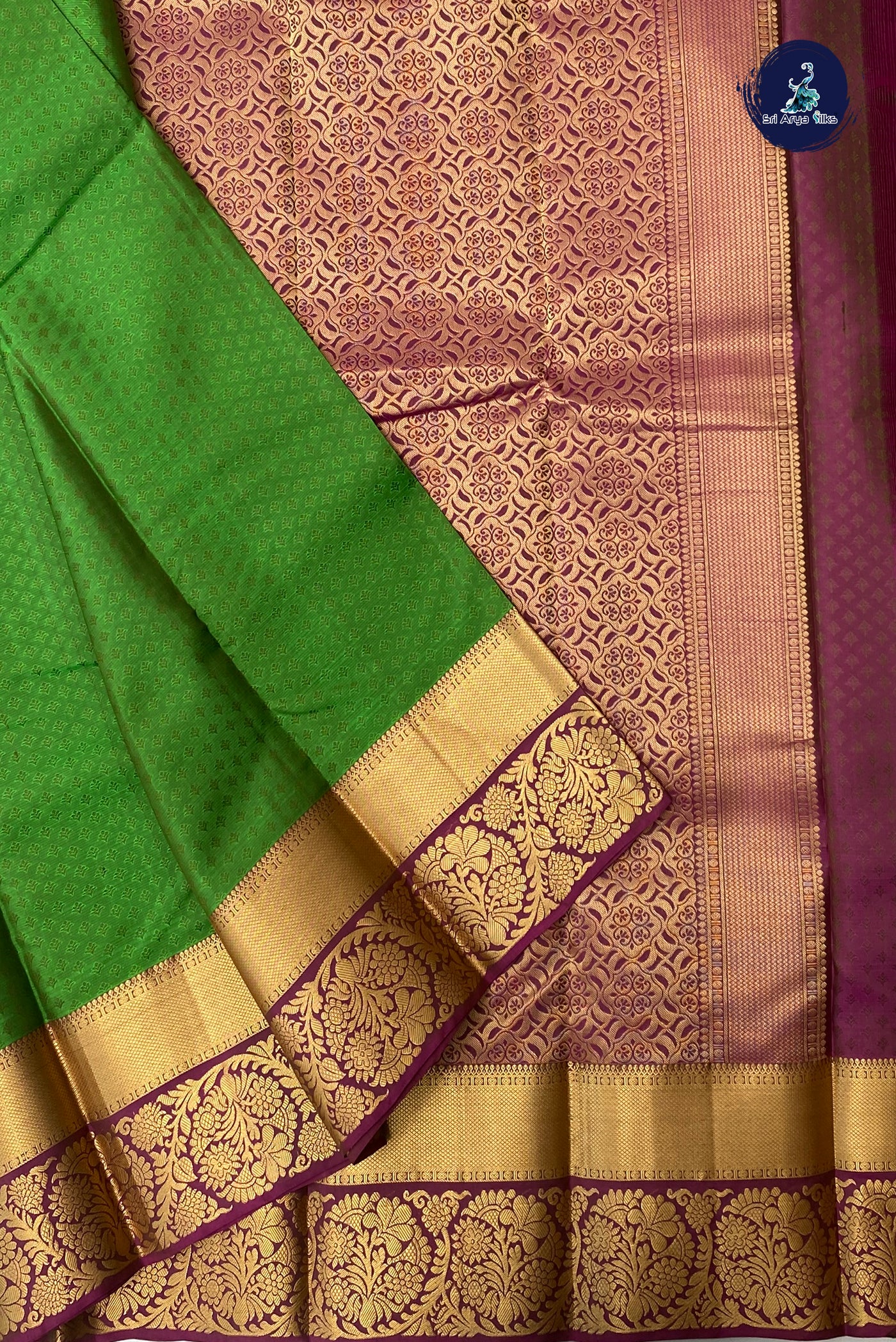 Green Bridal Silk Saree With Embossed Pattern
