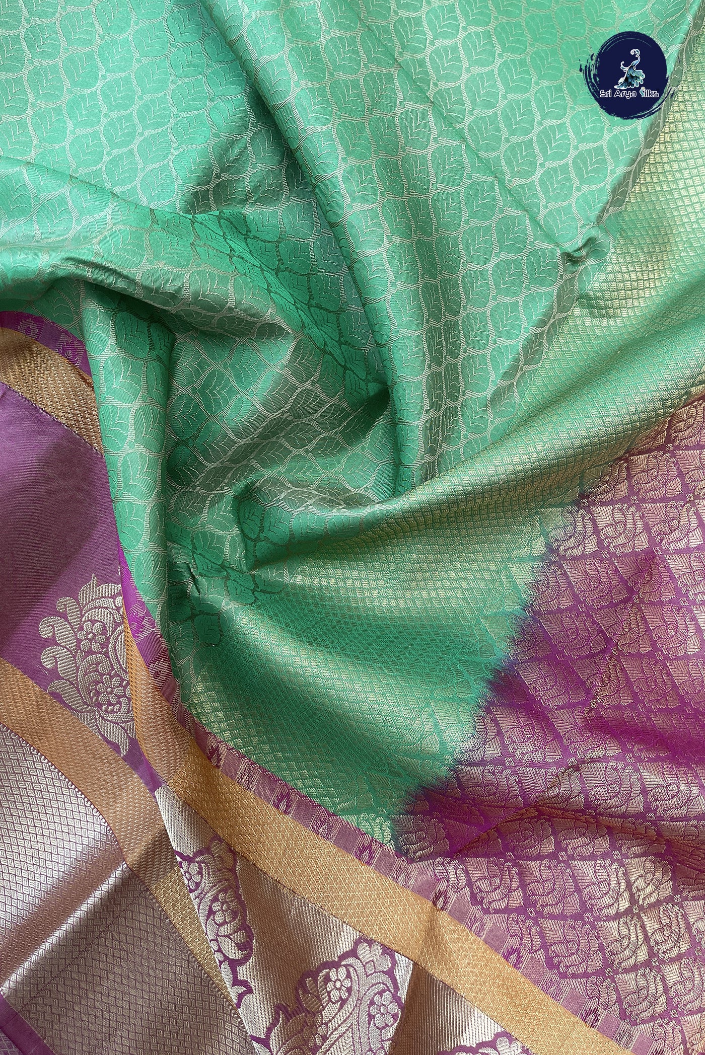 Light Green Bridal Silk Saree With Embossed Pattern