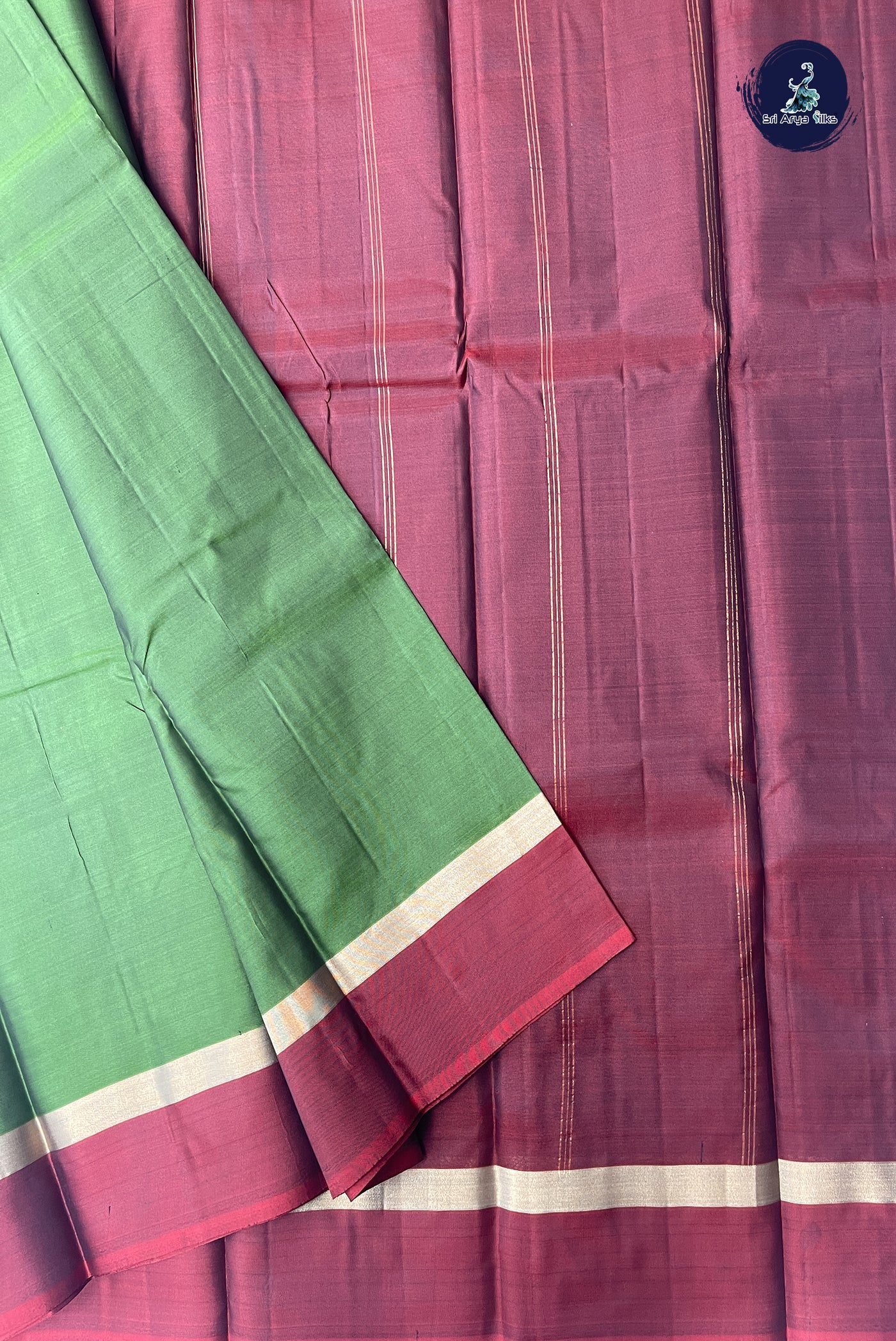 Mehendi Green Light Weight Silk Saree With Plain Pattern