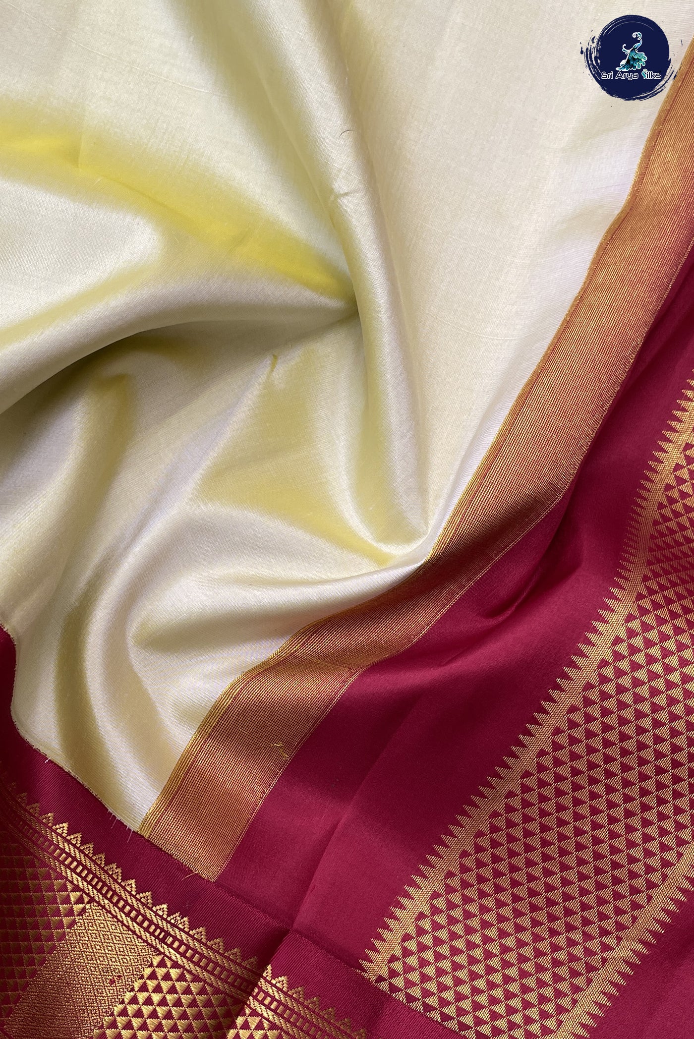 Creamish Yellow Silk Saree With Plain Pattern