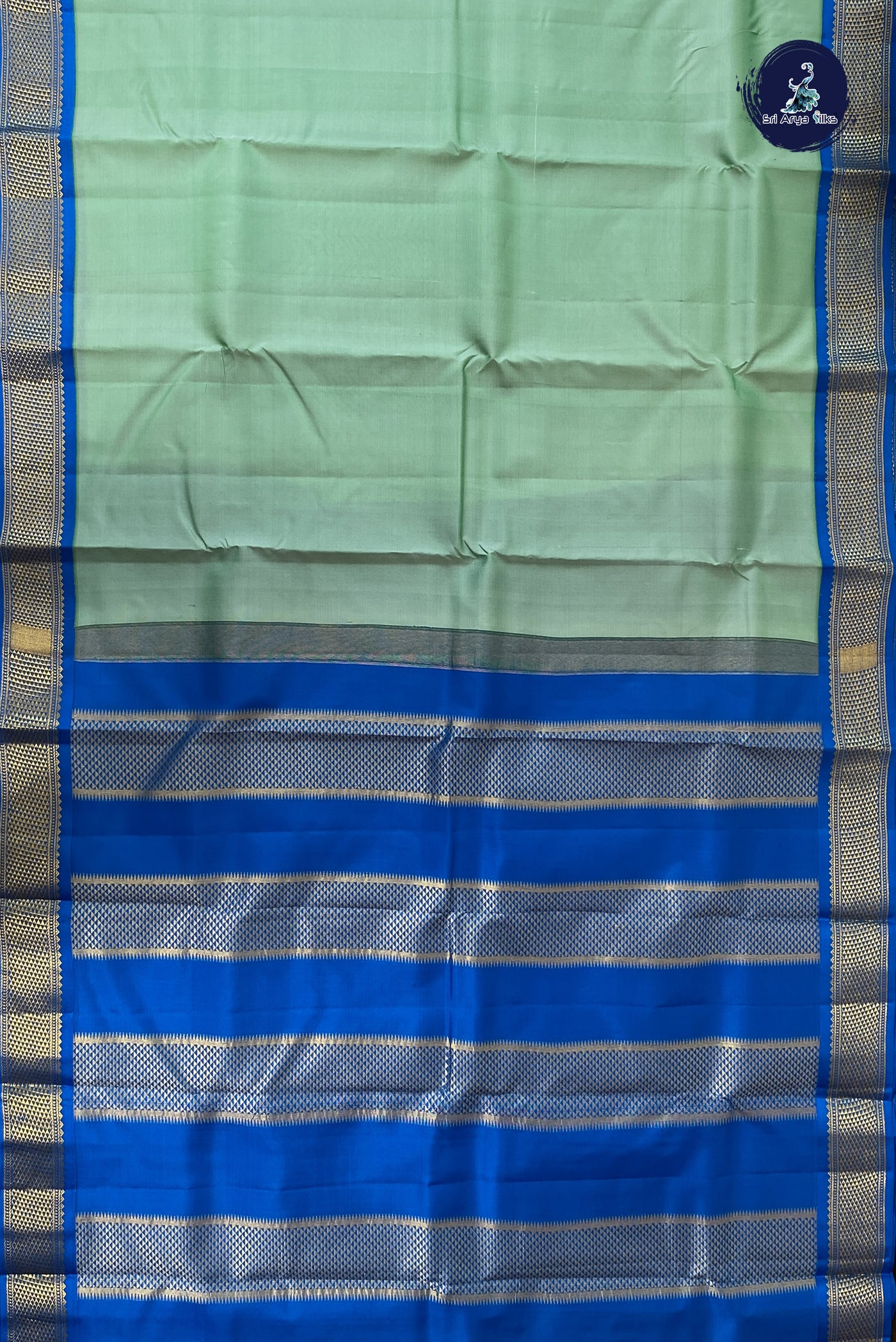 Pastel Green Silk Saree With Plain Pattern