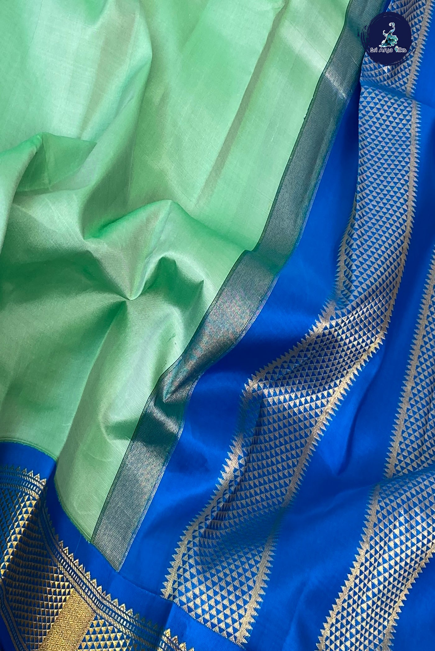 Pastel Green Silk Saree With Plain Pattern