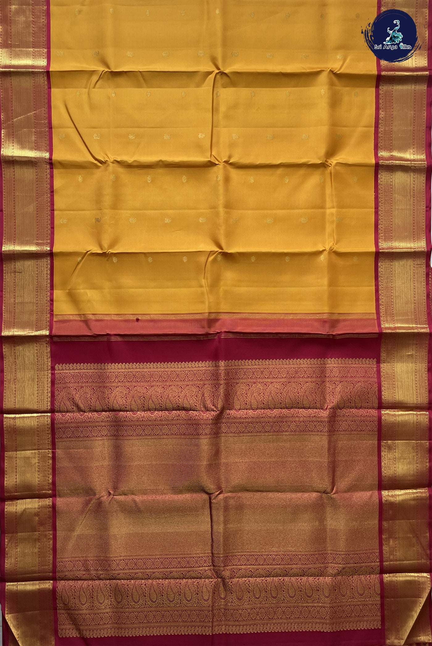 Turmeric Yellow Bridal Silk Saree With Zari Buttas Pattern