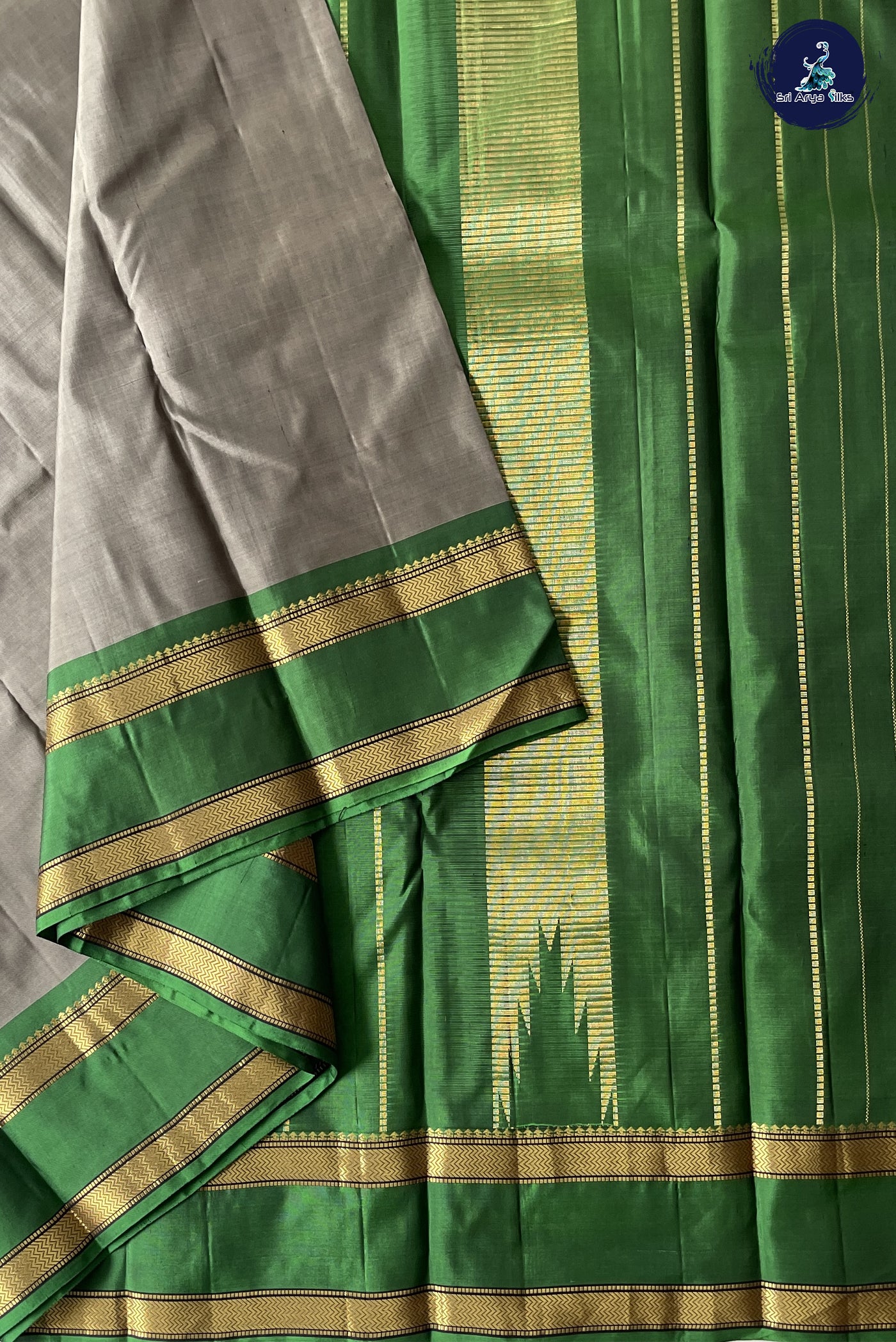 Greenish Grey Light Weight Silk Saree With Plain Pattern