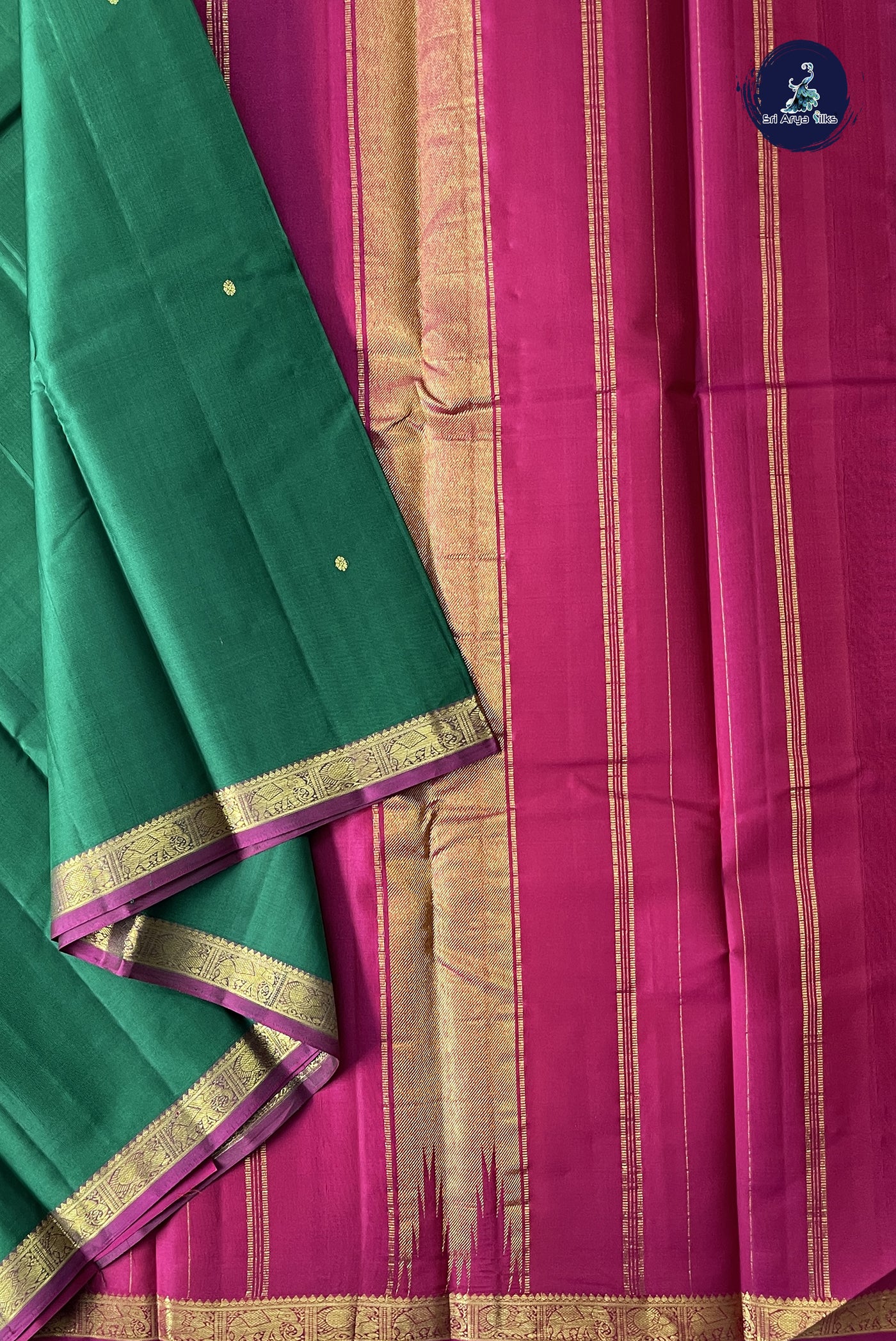 Dark Green Light Weight Silk Saree With Zari Buttas Pattern