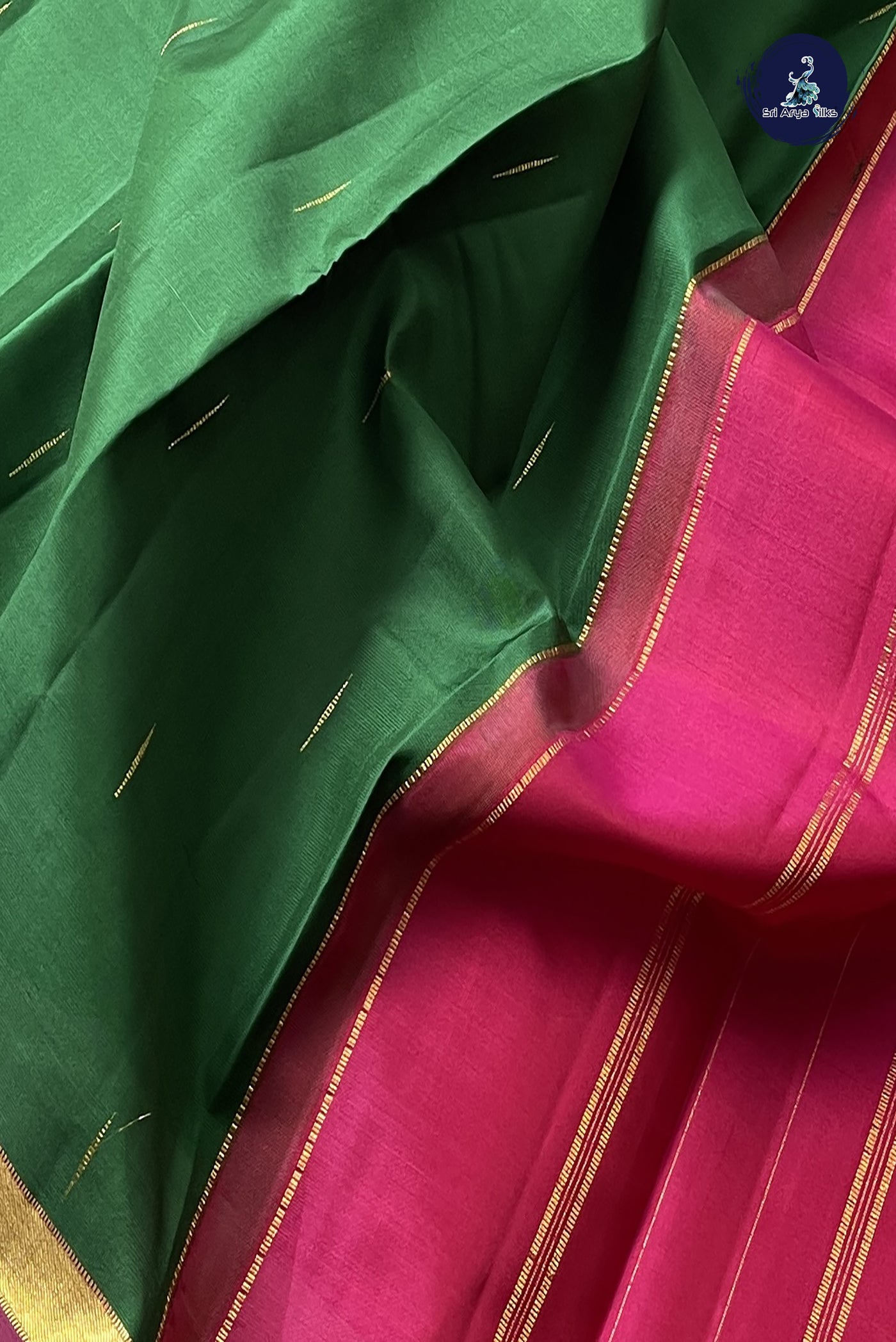 Dark Green Light Weight Silk Saree With Zari Buttas Pattern