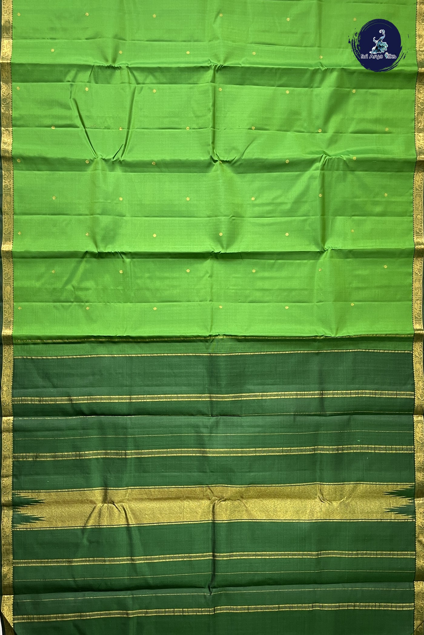 Light Green Traditional Silk Saree With Zari Buttas Pattern