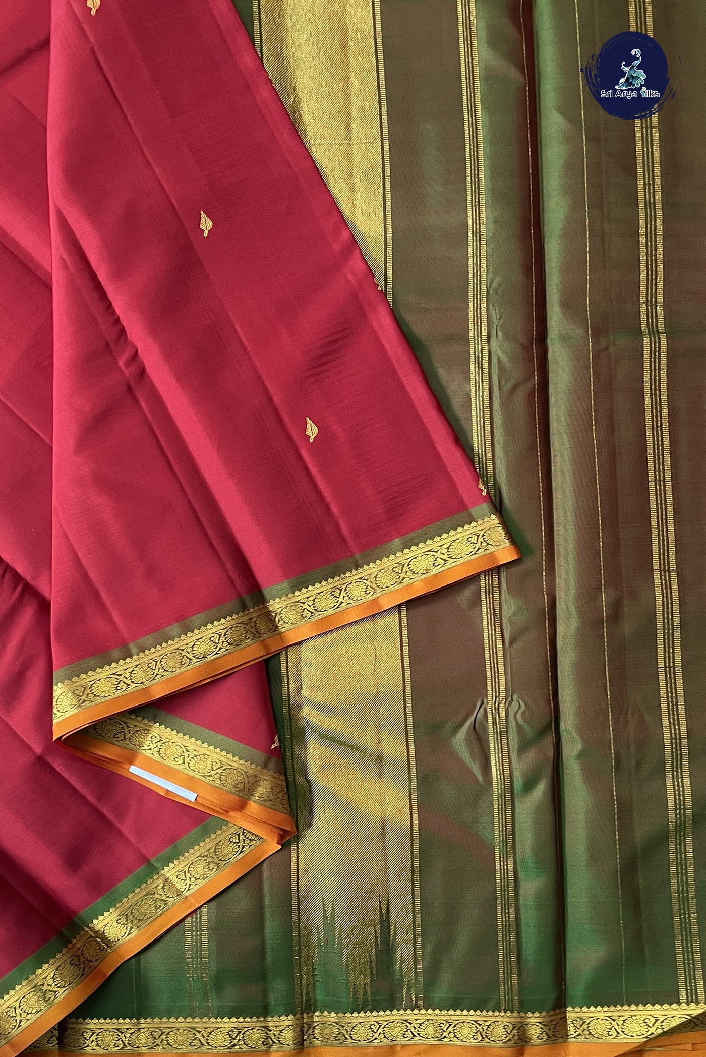 Maroon Traditional Silk Saree With Zari Buttas Pattern