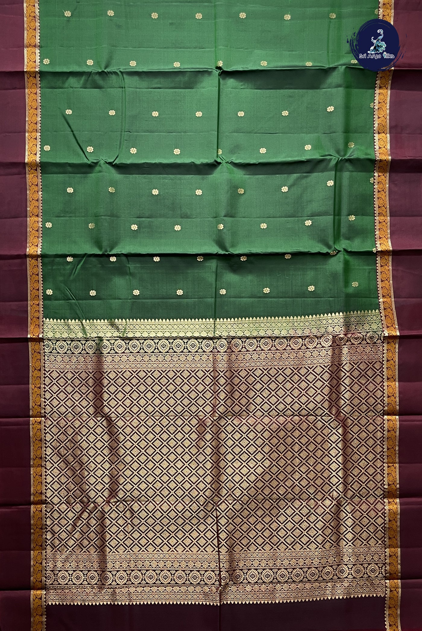 Dark Green Traditional Silk Saree With Zari Buttas Pattern